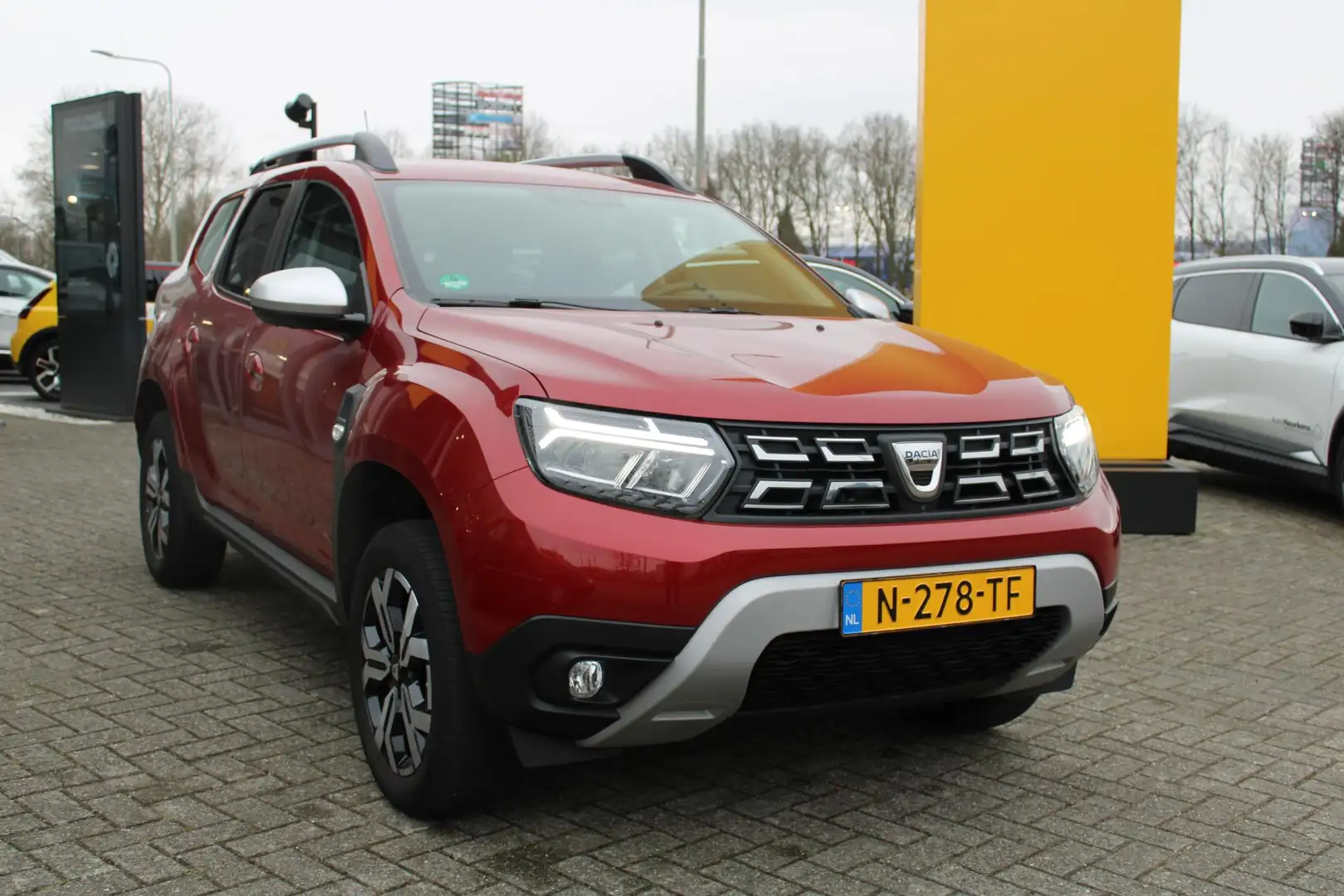 Dacia Duster TCe 100 Bi-Fuel Prestige | LPG | TREKHAAK | Origin Rood - 2