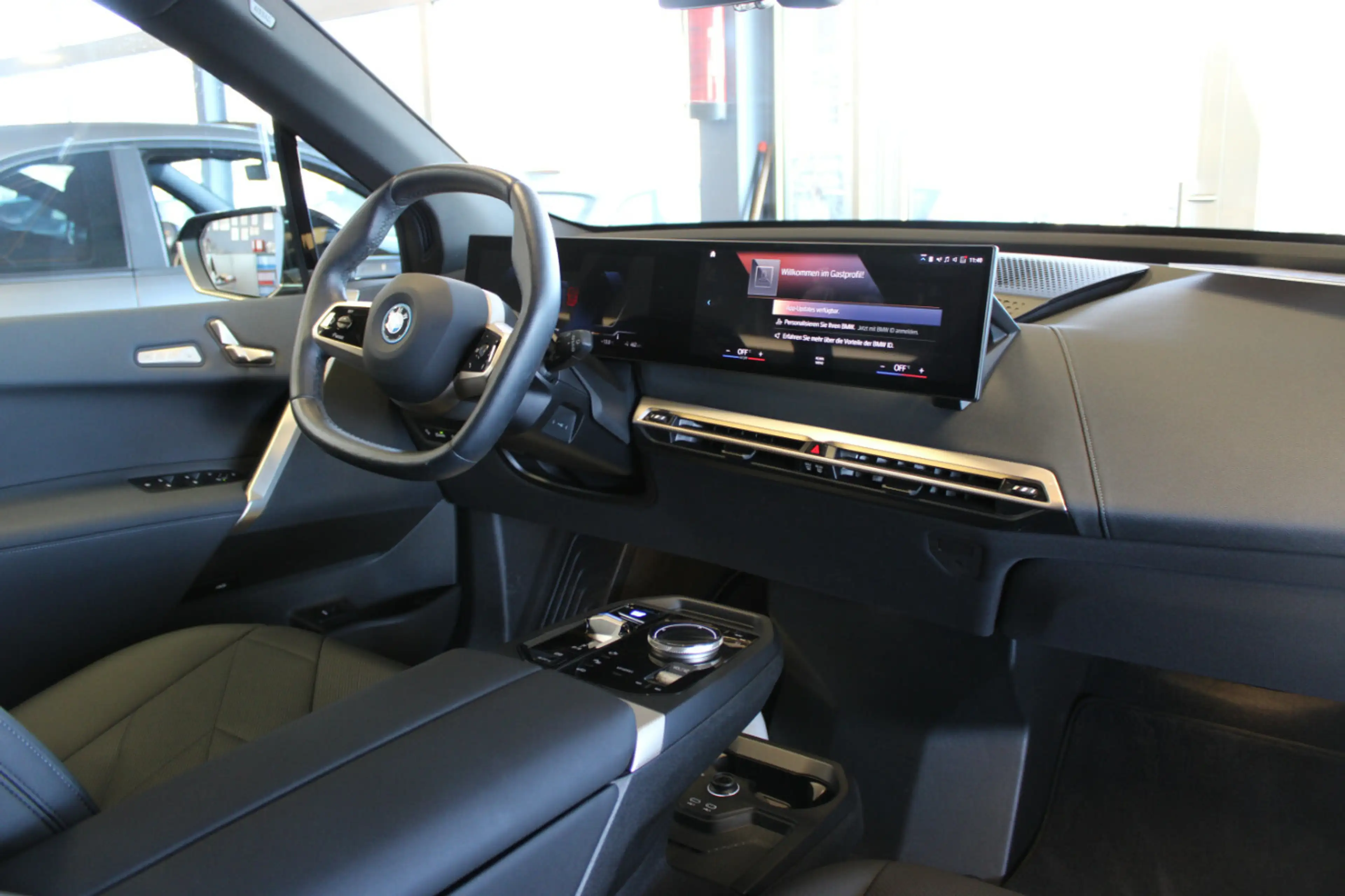 BMW iX xDrive50 — photo 11