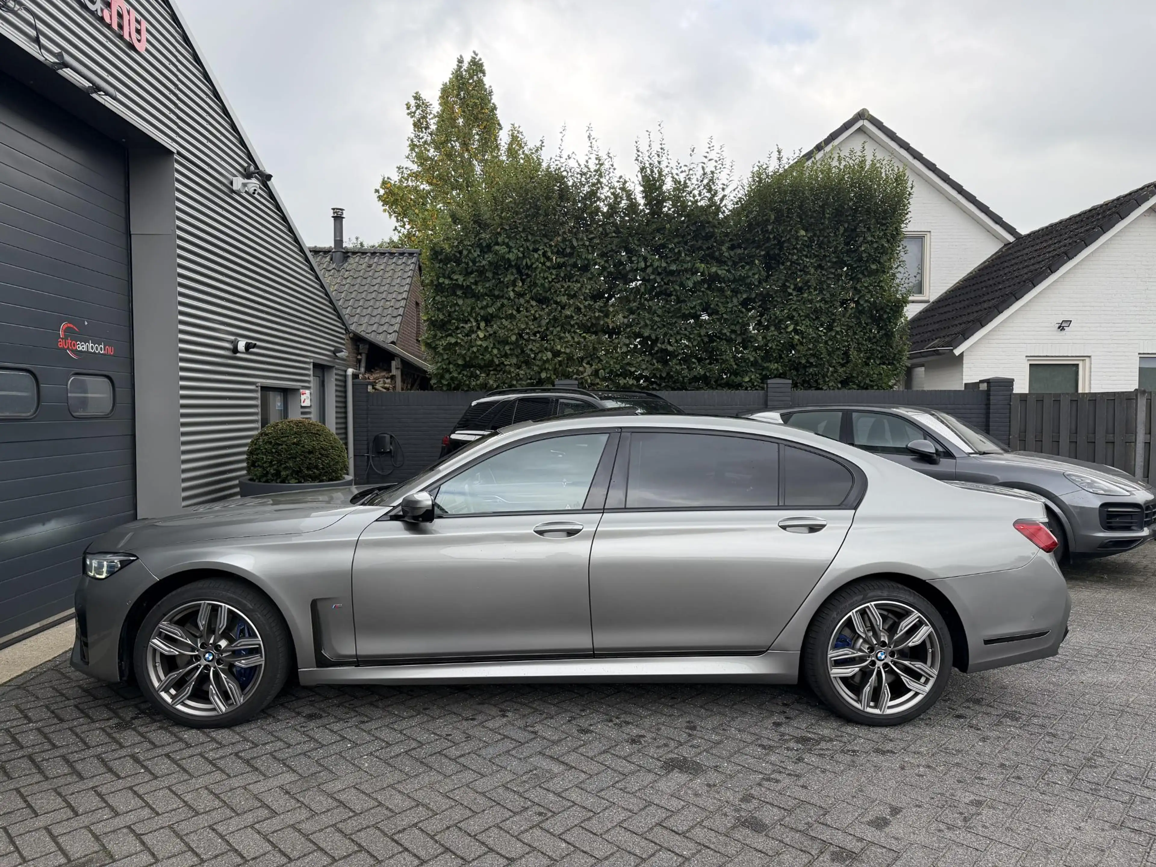 BMW 750 7-serie 750Li xDrive High Executive M-Sport | Pano — photo 7