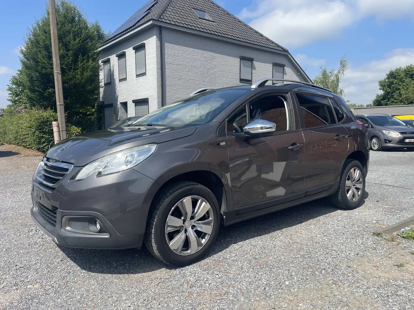 Peugeot 2008 BlueHDi ,Airco,Gps,Sensoren,82.000km.,1e eigenaar Grijs - 1