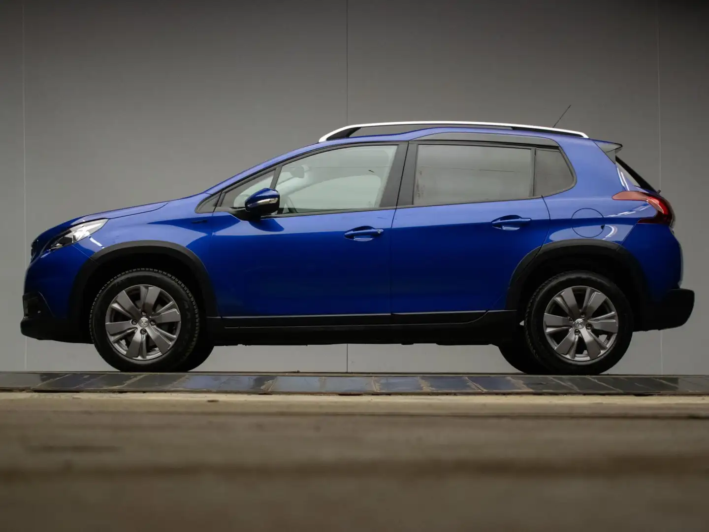 Peugeot 2008 1.2 PureTech Signature Sport (APPLE CARPLAY,NAVI,C Blauw - 1