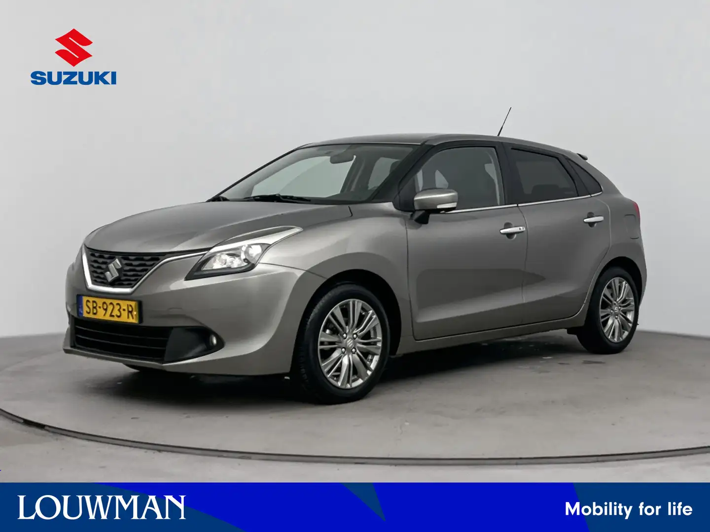Suzuki Baleno 1.2 High Executive Automaat | Navigatie | Lichtmet Grijs - 1