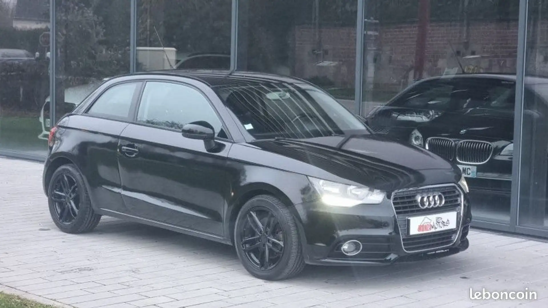 Audi A1 1.6 TDI 105CH FAP AMBITION Noir - 1