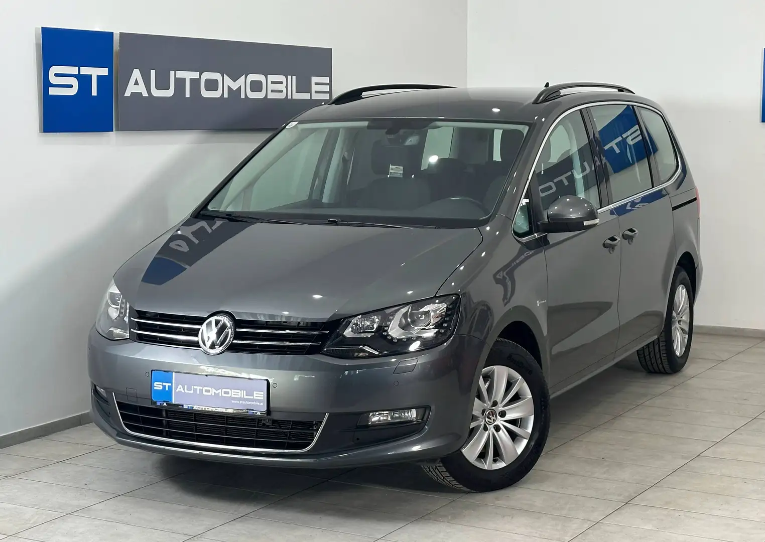 Volkswagen Sharan Comfortline BMT Aut. // AHK // 7-SITZER // NAVI // Grau - 1