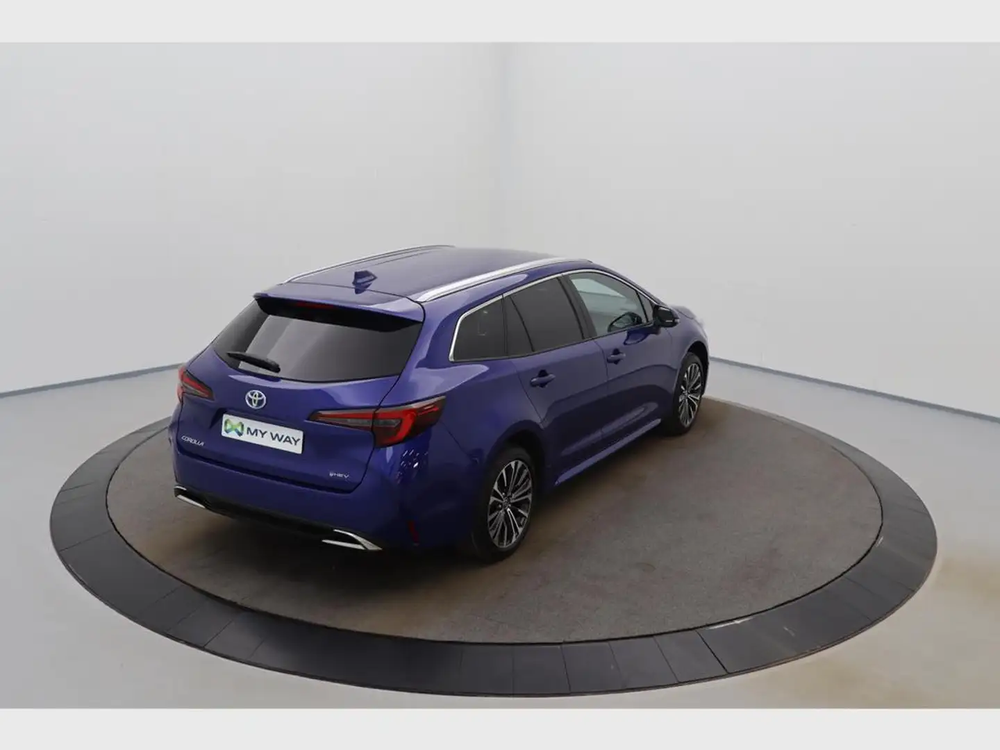Toyota Corolla Corolla TS 1.8 Hybrid Style e-CVT GPF Grijs - 2