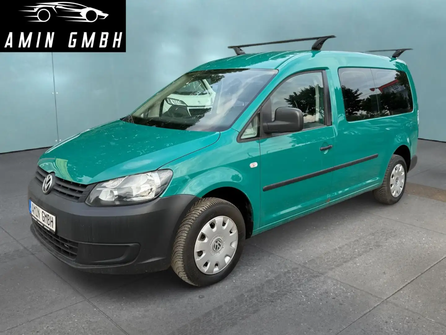 Volkswagen Caddy 1.6 TDI Maxi Startline Navi Grün - 1