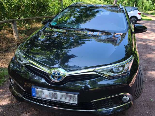 Imagine Toyota Auris Auris 1.8 VVT-i Hybrid Touring Sports Executive