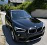 BMW X1 sDrive 18 i Advantage Schwarz - thumbnail 1