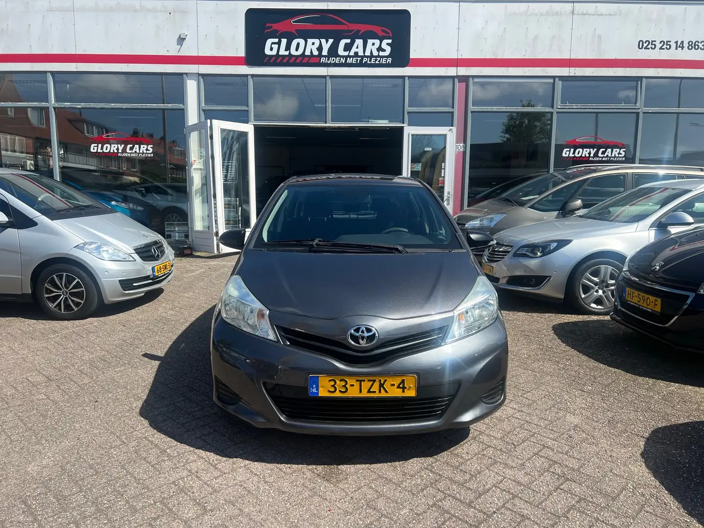 Toyota Yaris 1.0 VVT-i Comfort Grijs - 1