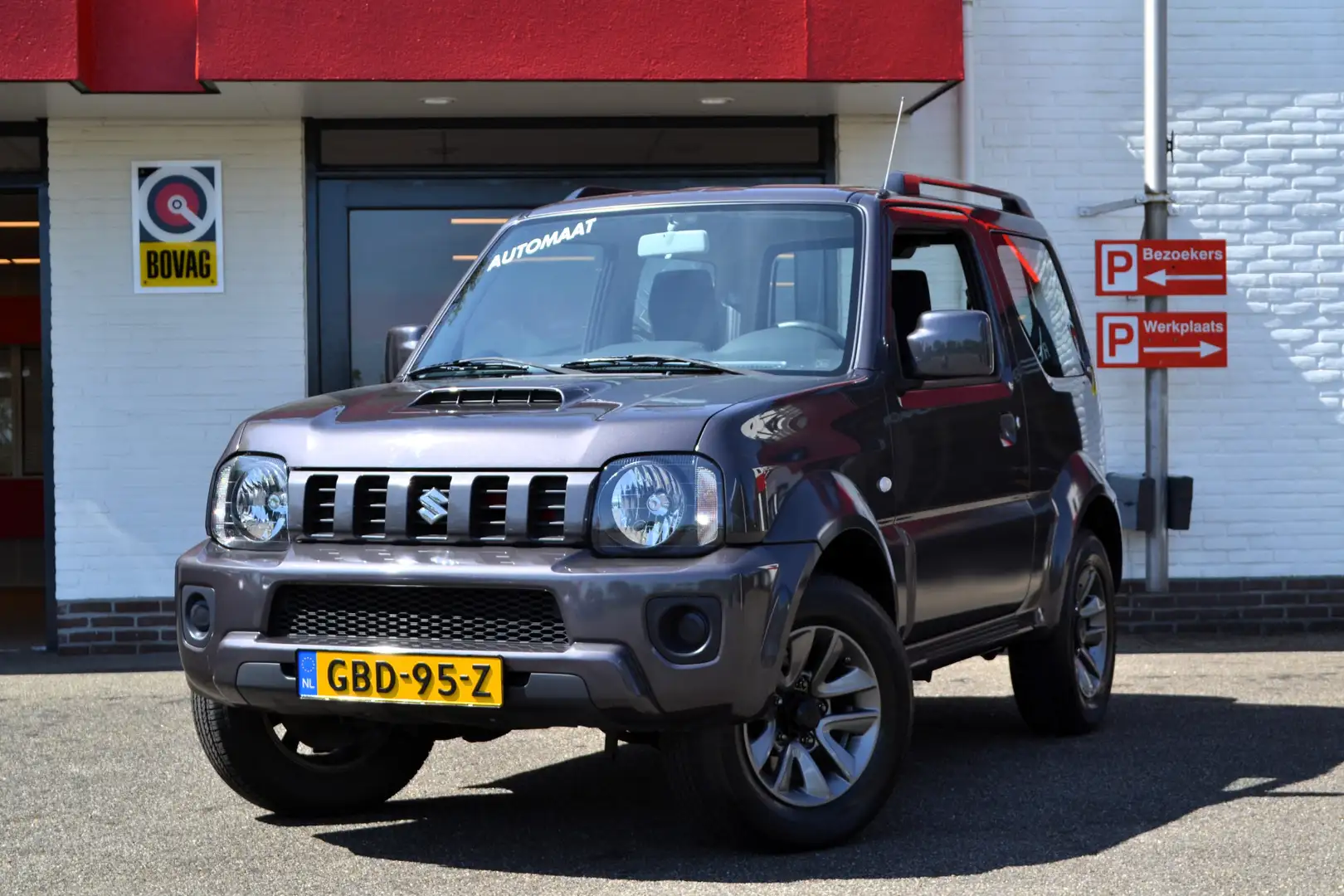 Suzuki Jimny 1.3 Exclusive, Automaat, 4X4, Airco, 36.000 km ! H Gris - 1