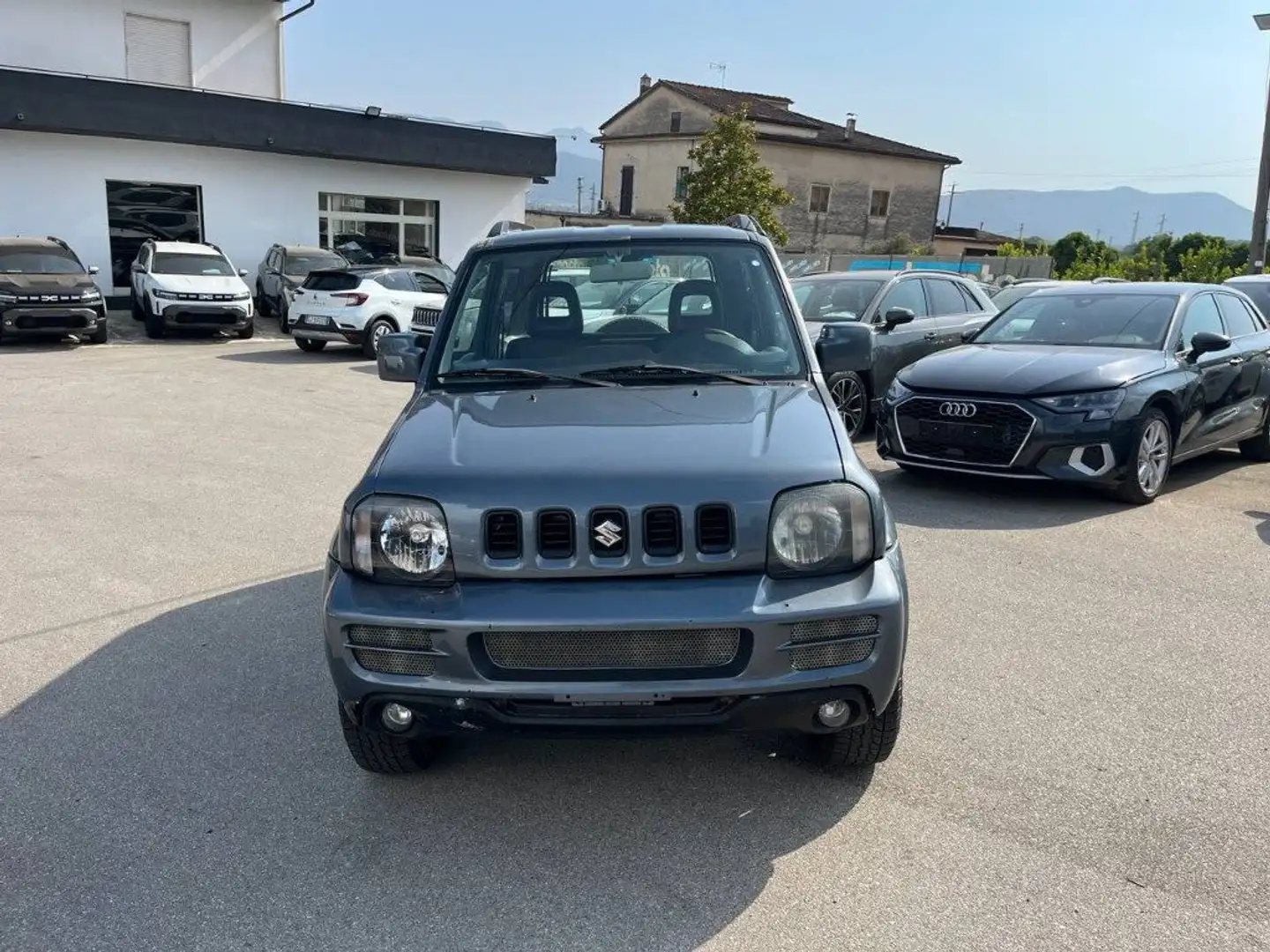 Suzuki Jimny 1.3i 16V cat 4WD JLX Più AUTOCARRO Grigio - 1