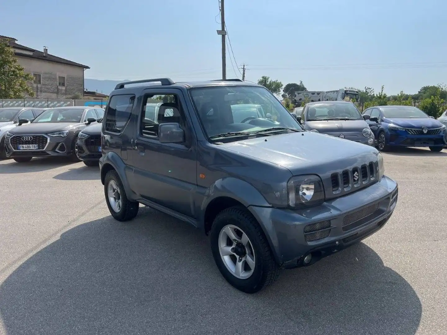 Suzuki Jimny 1.3i 16V cat 4WD JLX Più AUTOCARRO Grigio - 2
