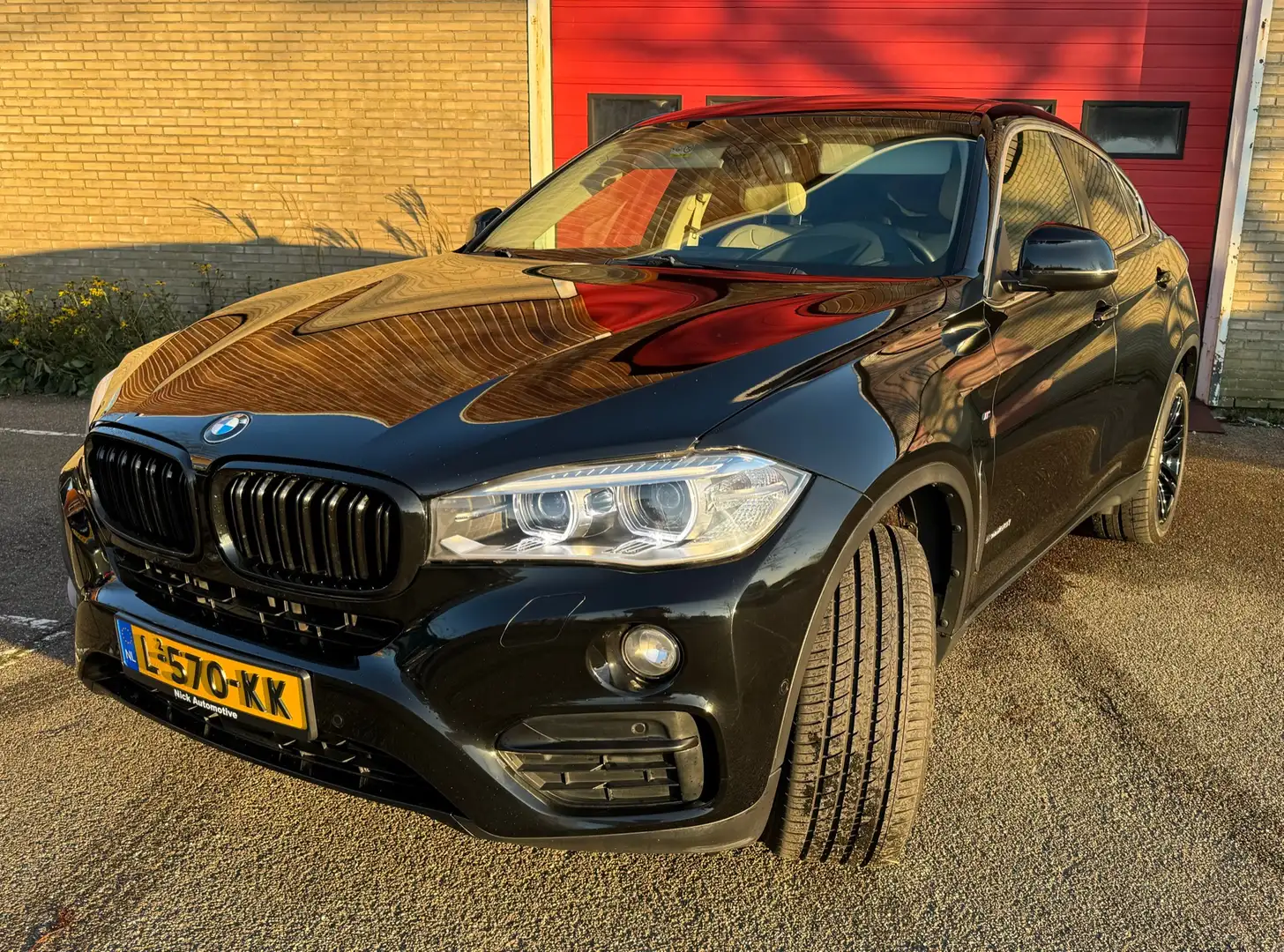 BMW X6 xDrive50i High Ex. Zwart - 1
