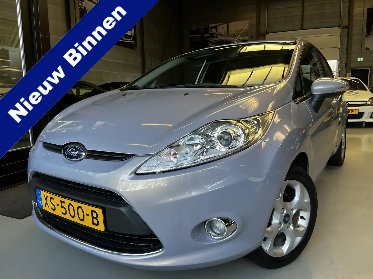 Ford Fiesta 1.25 Titanium Airco, Clima, Lichtmetalen velgen Grijs - 1