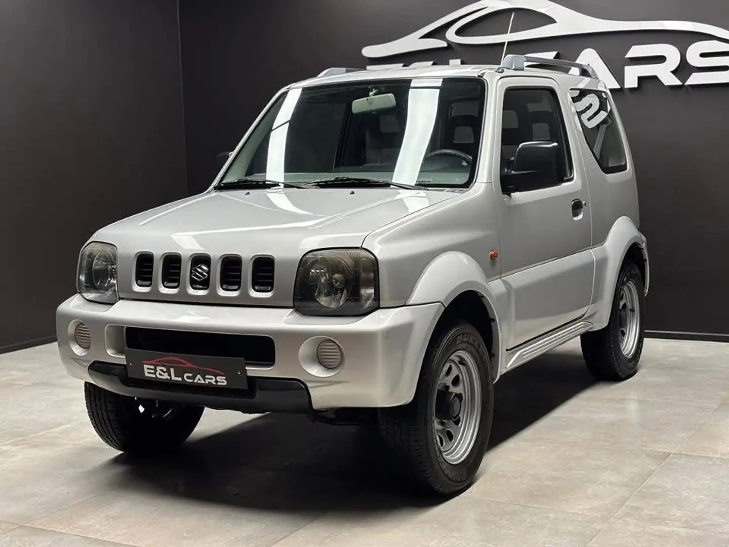 Suzuki Jimny 1.3i 16v Sélecteur 4X4 (2H-4H-4L) Gris - 1