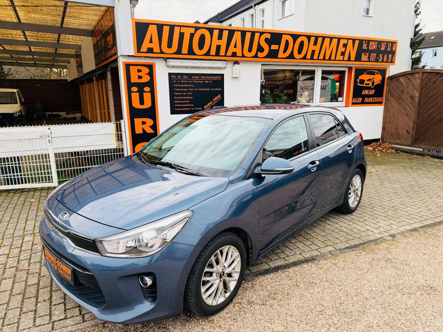 Kia Rio aus 1 Hand+Scheckheft+Kamera+Navi Blau - 1