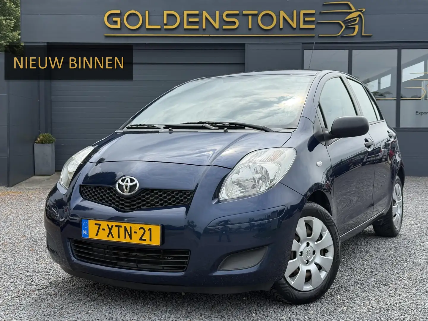 Toyota Yaris 1.3 VVTi Comfort 2e Eigenaar,Airco,Cruise,5 deurs, Blauw - 1