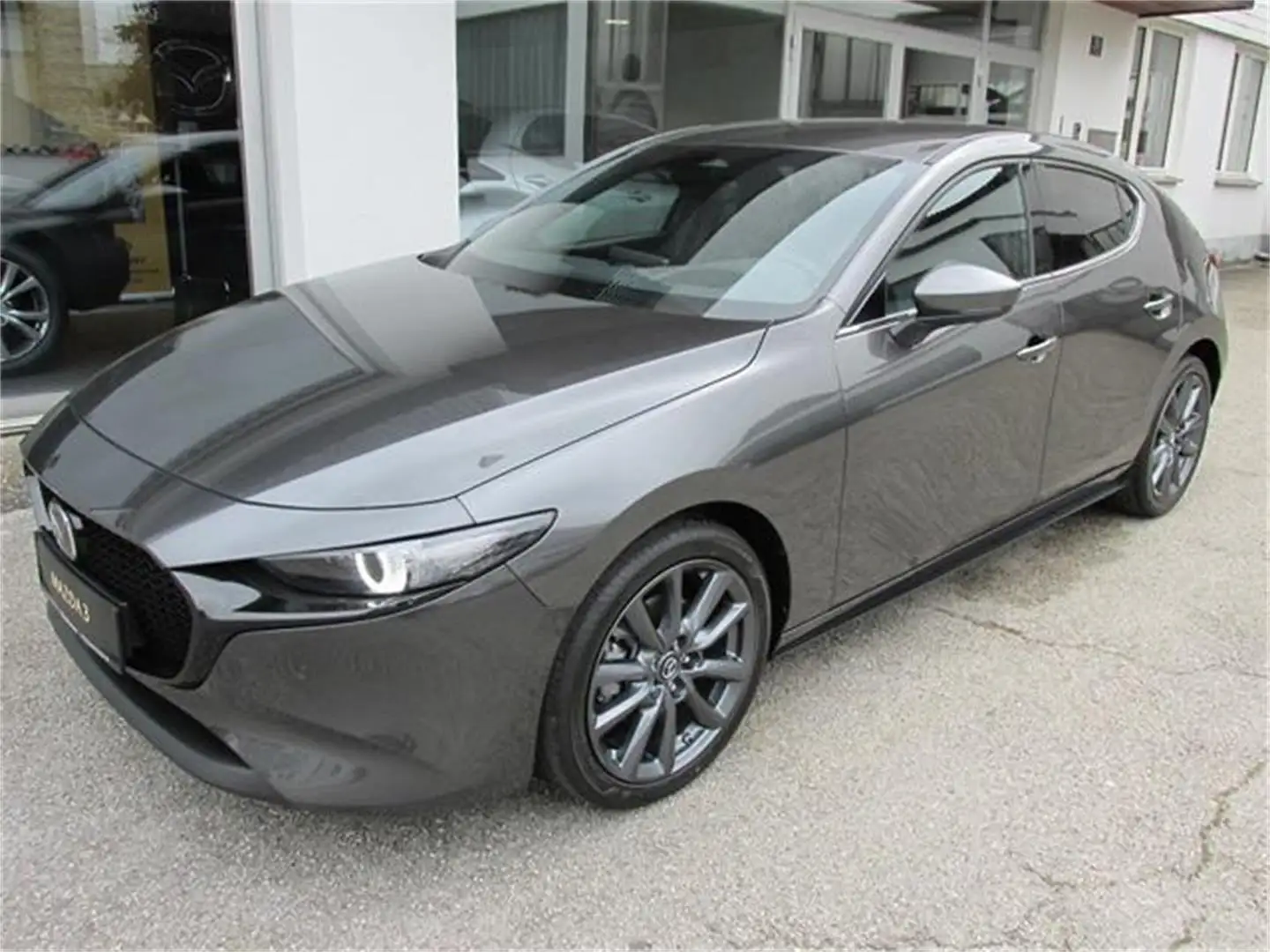 Mazda 3 2025 5HB 2.5L e-SKYACTIV G 140ps 6MT 2WD EX Grau - 1