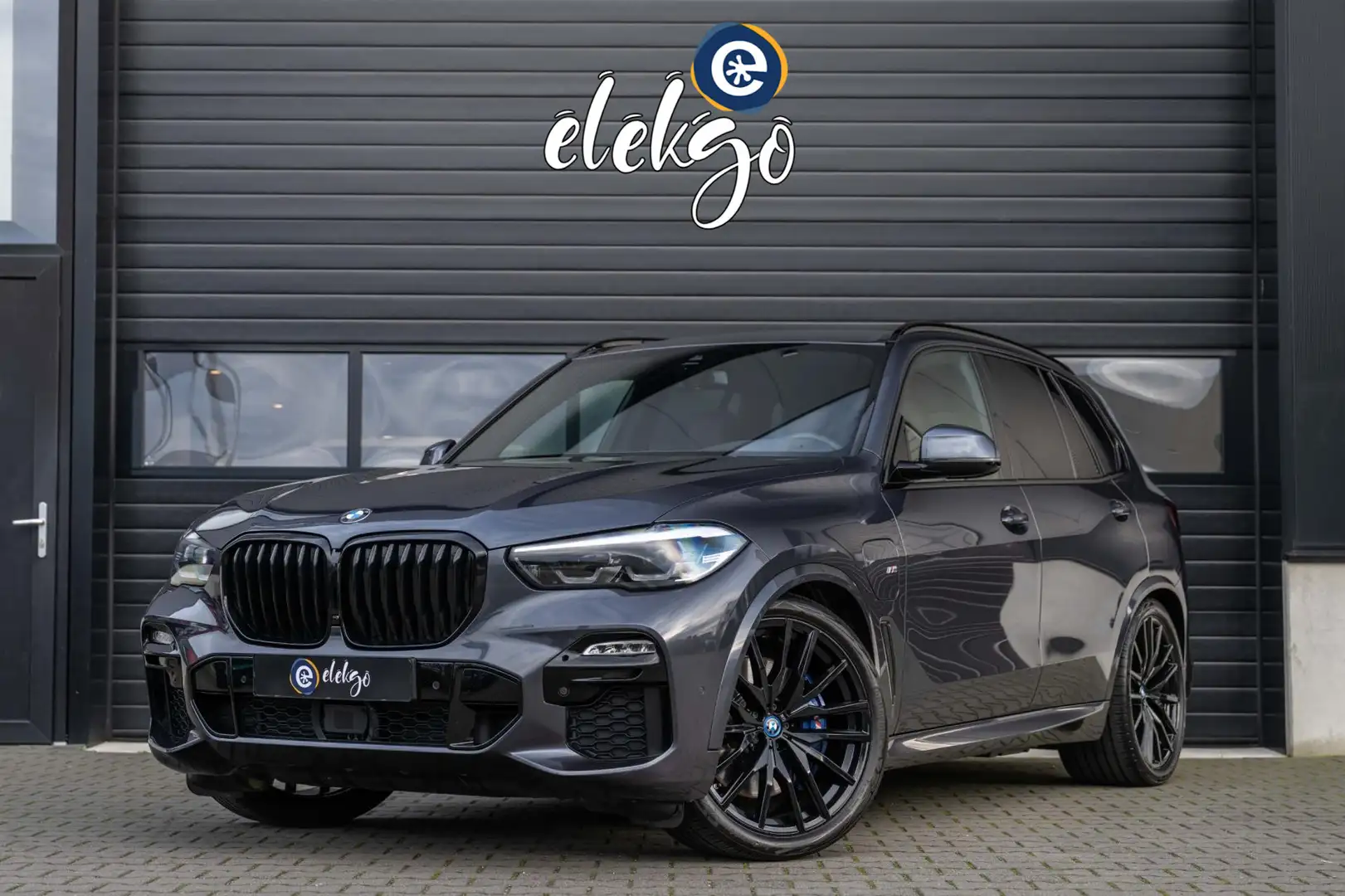 BMW X5 XDrive45e High Executive M-Sport|Pano|Trekhaak|HuD Grijs - 1