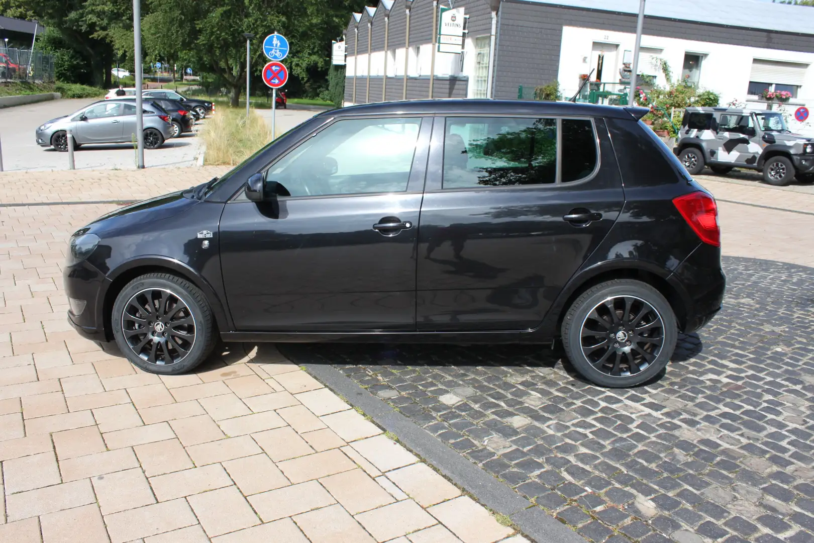 Skoda Fabia 1.2 TSI MONTE CARLO/1-Hand/Alu/Klima. Schwarz - 1