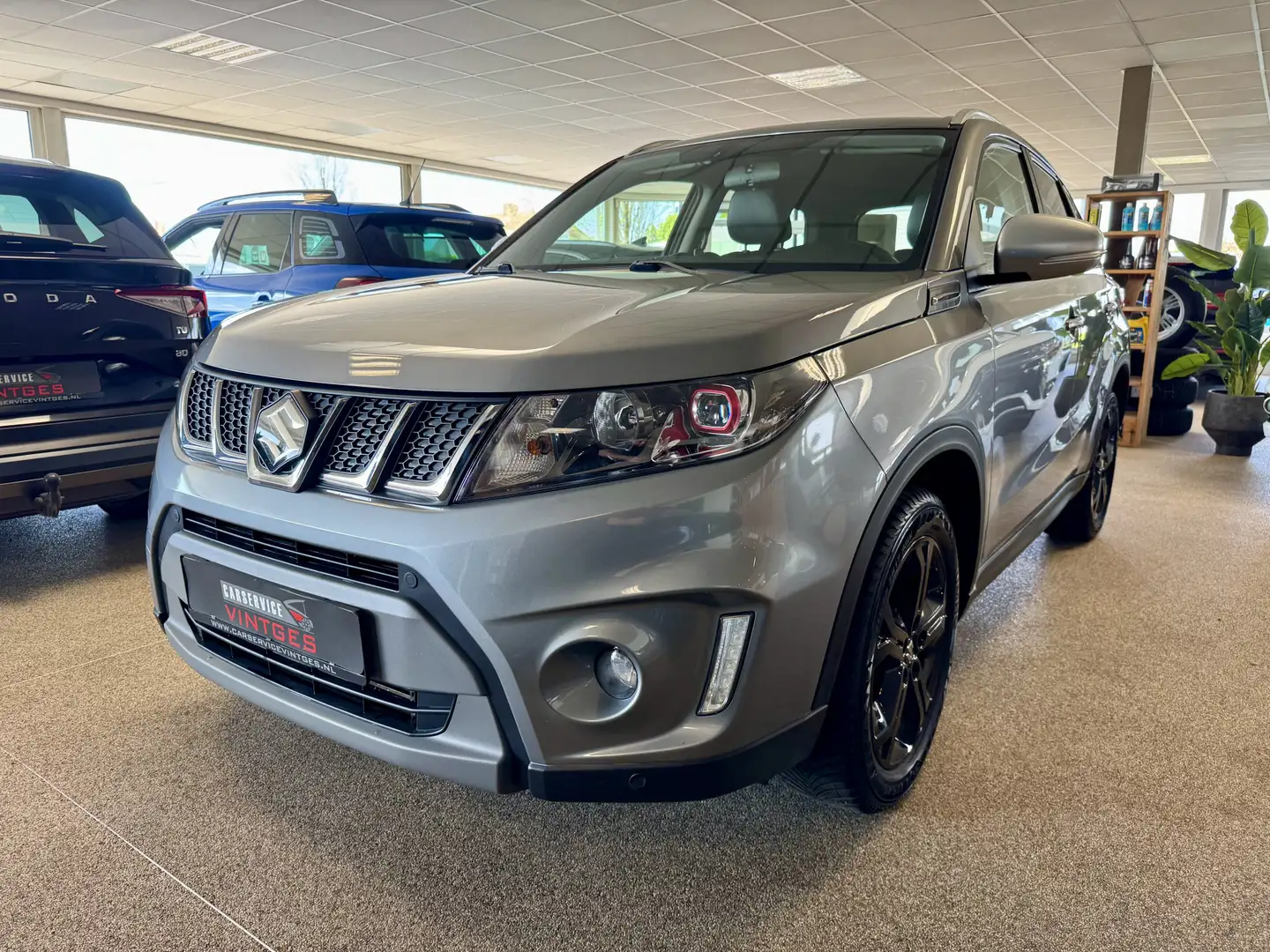 Suzuki Vitara 1.4 S Allgrip 4x4 Camera, Navi, L/m, Automaat, zee Grijs - 1