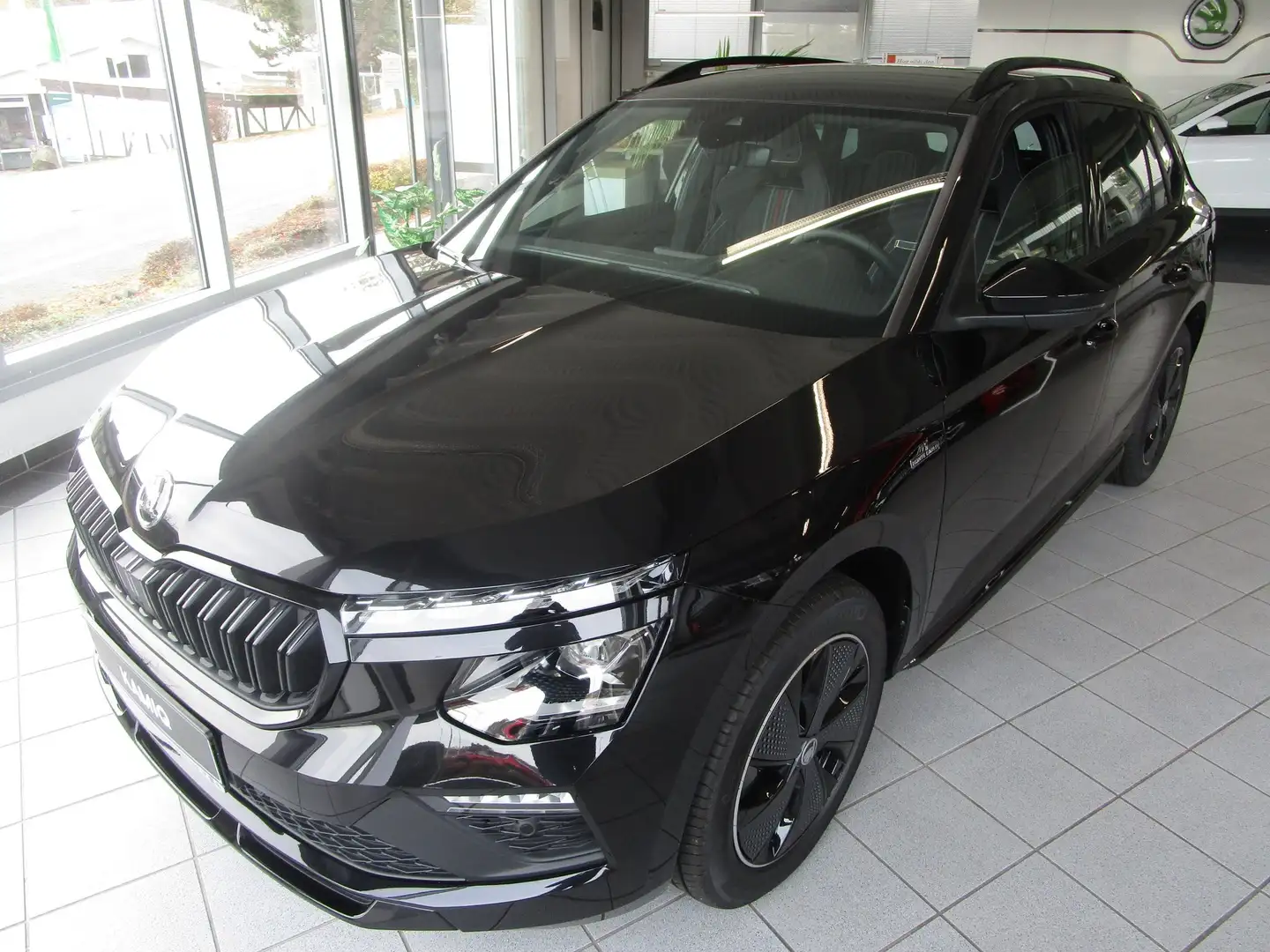 Skoda Kamiq 1.5 TSI Monte Carlo 7-Gang DSG Zwart - 1