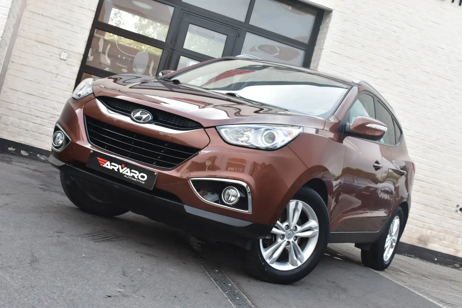 Hyundai iX35 1.6i Xenon / Leder / Cruise / PDC / Car Play Brun - 1