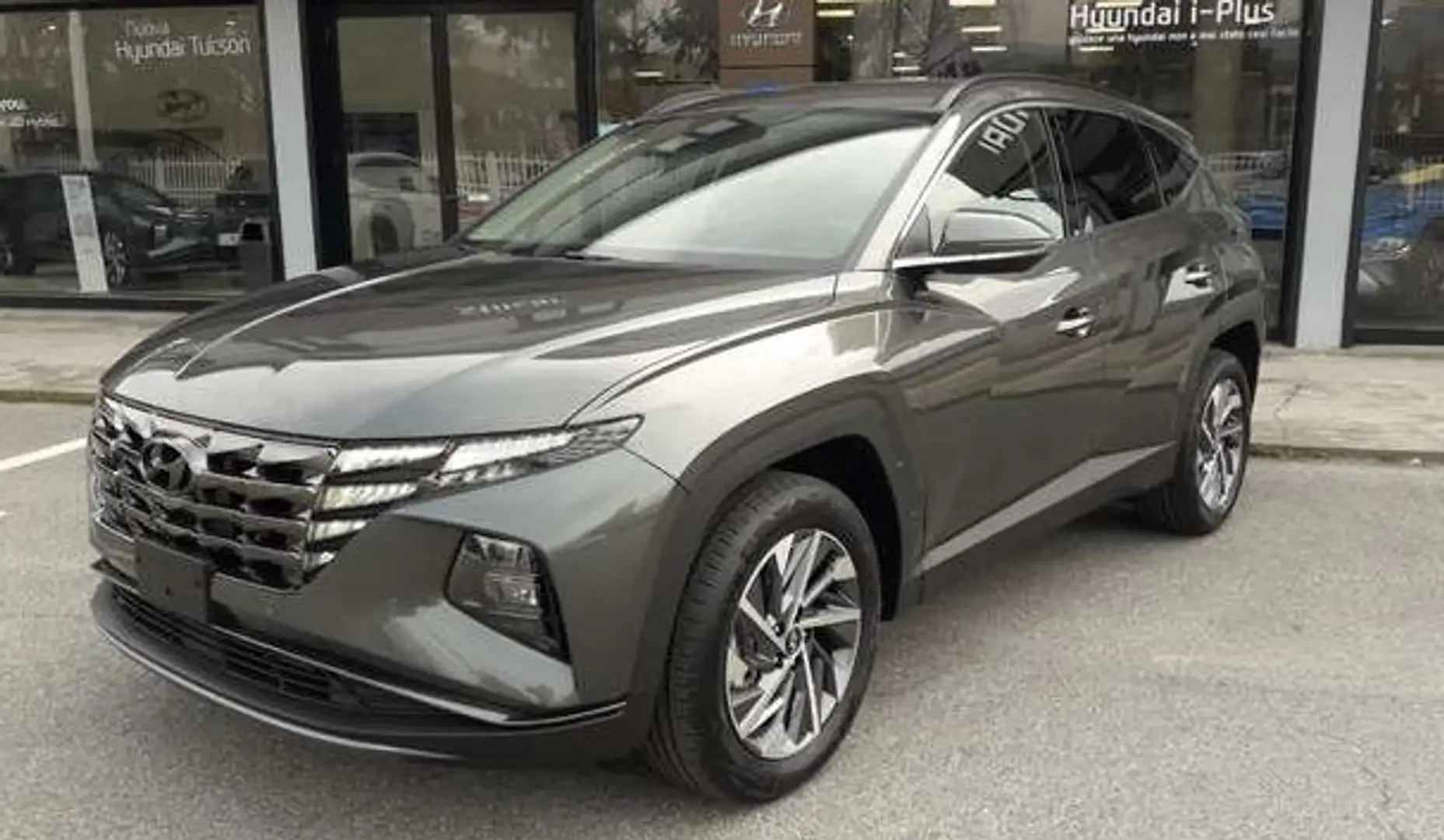 Hyundai TUCSON 1.6 NAVI - CAMERA - VERWARMDE ZETELS Gris - 1