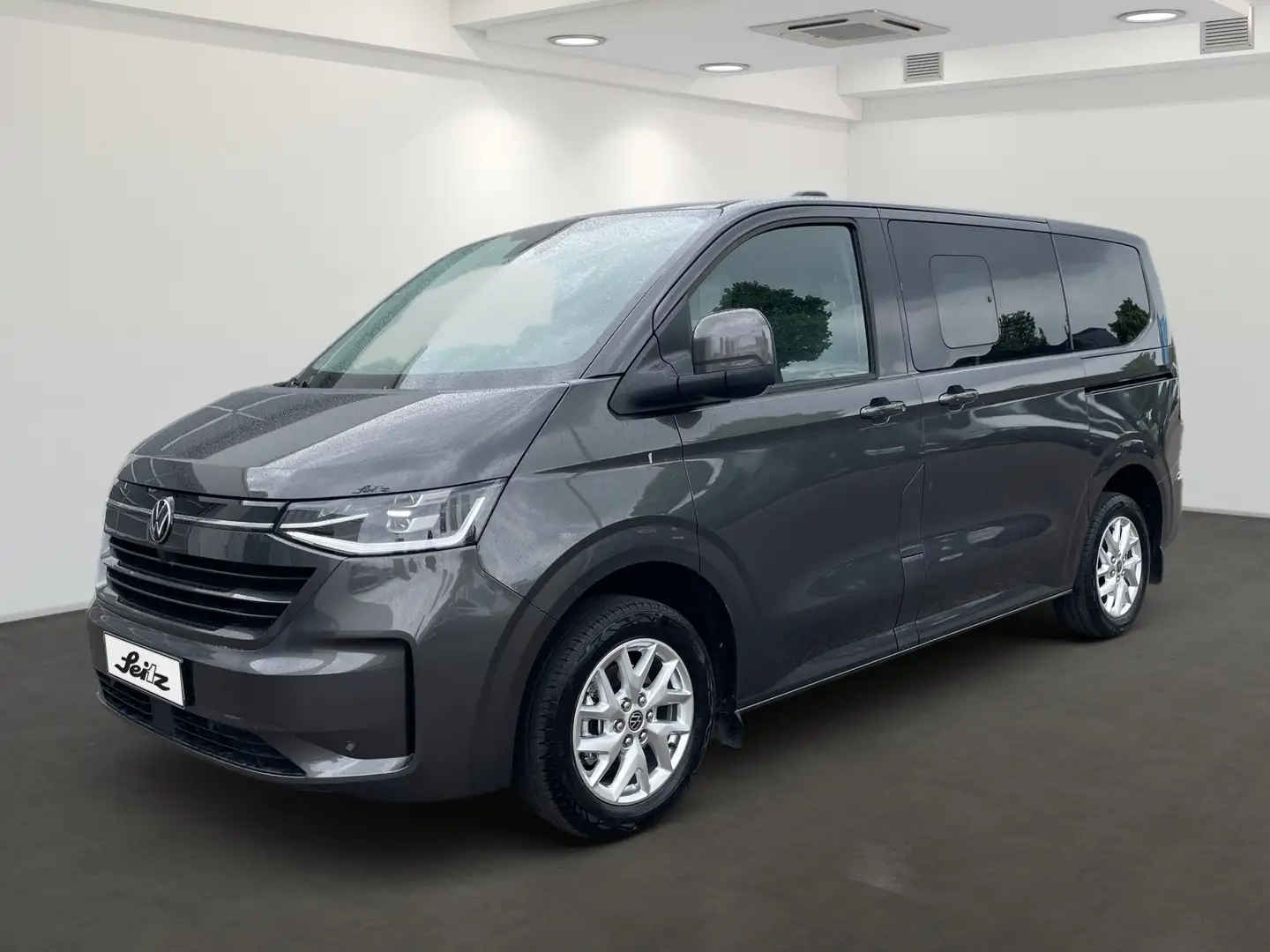 Volkswagen T7 Caravelle KR e-Caravelle Style *8-SITZER*AHK*PANO* Grau - 2
