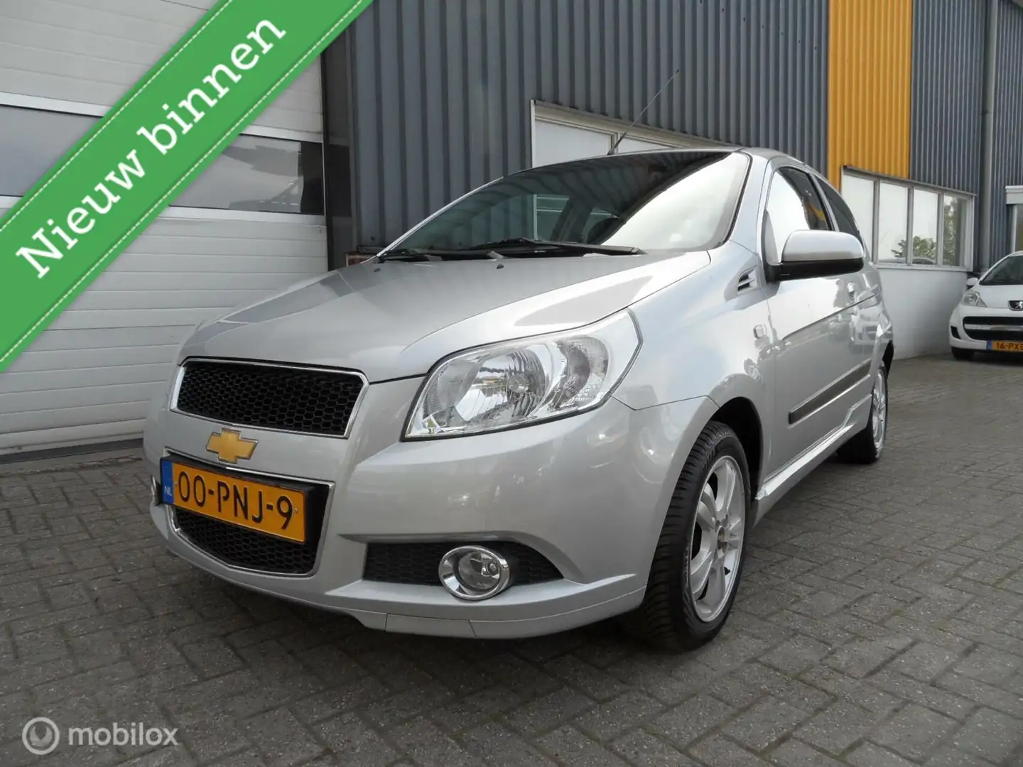 Chevrolet Aveo 1.2 16V LS+ NETTE AUTO! Grijs - 1