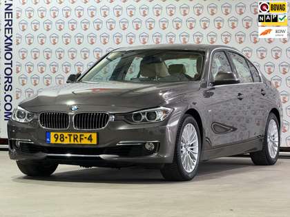BMW 320 3-serie 320i High Executive Luxury/SCHUIFDAK/TREKH