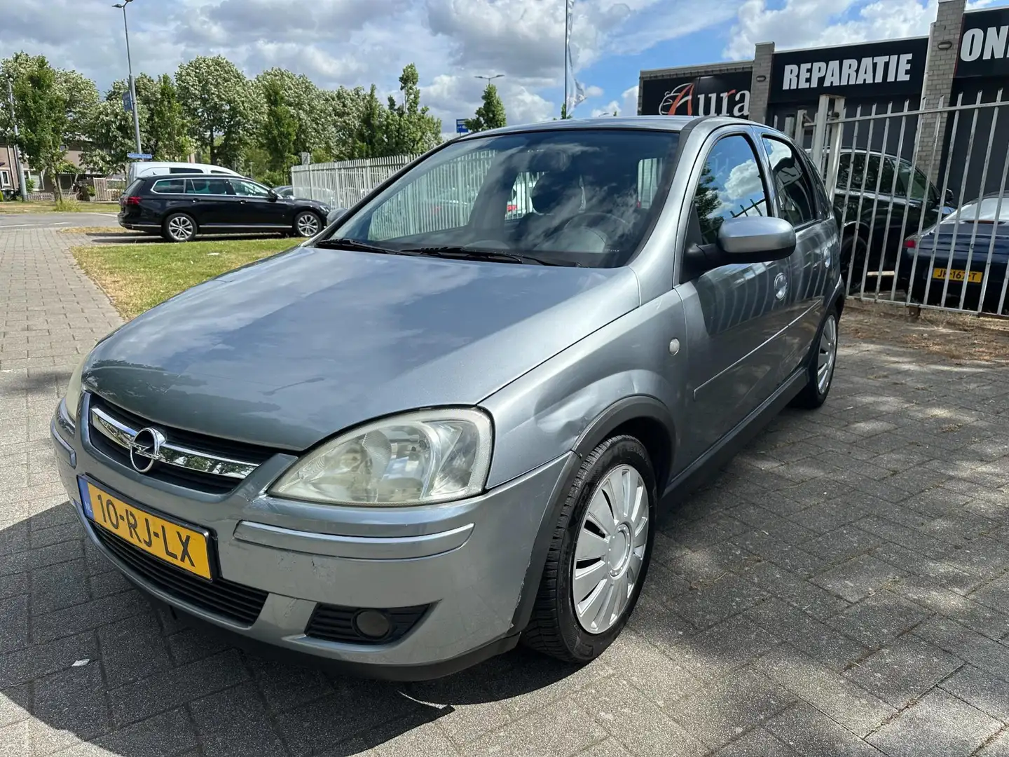 Opel Corsa 1.2-16V Cosmo Gris - 1