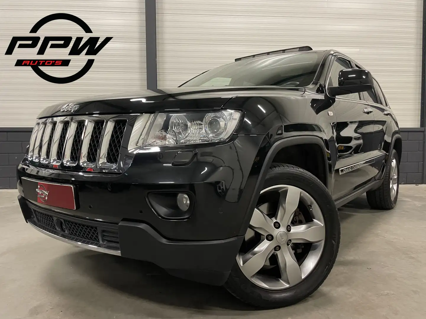 Jeep Grand Cherokee 5.7 V8 Hemi Overland 353PK EDITION PANO/LUCHTVERIN Noir - 1