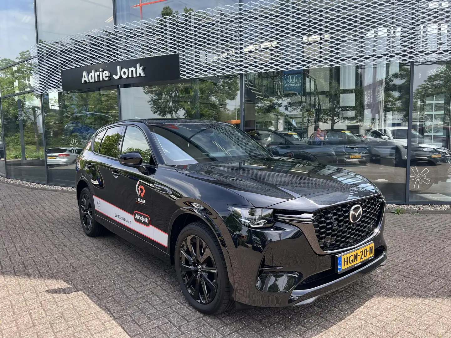 Mazda CX-60 2.5 e-SkyActiv PHEV Homura Plus | AUTOMAAT | APPLE Zwart - 1