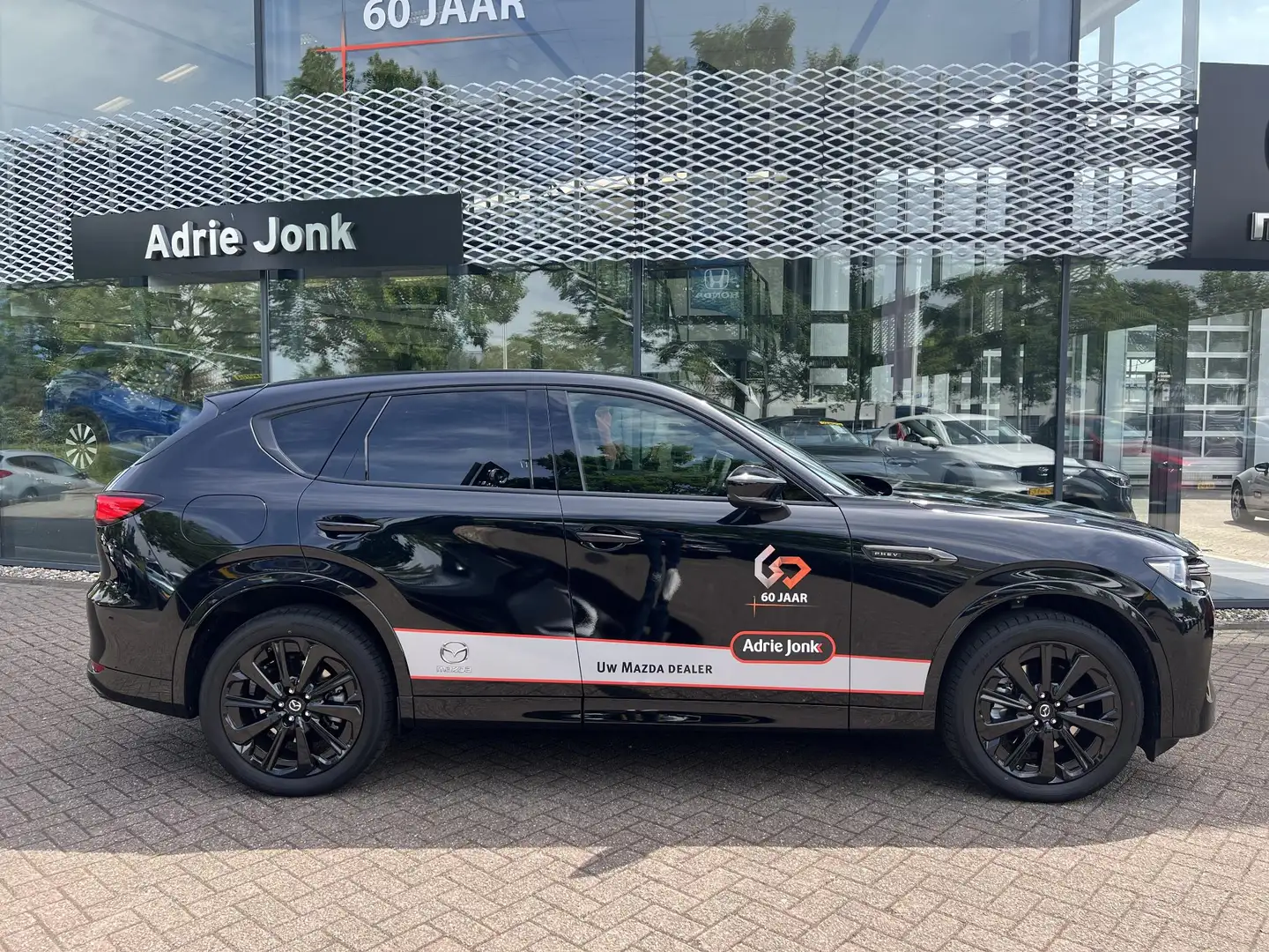 Mazda CX-60 2.5 e-SkyActiv PHEV Homura Plus | AUTOMAAT | APPLE Zwart - 2