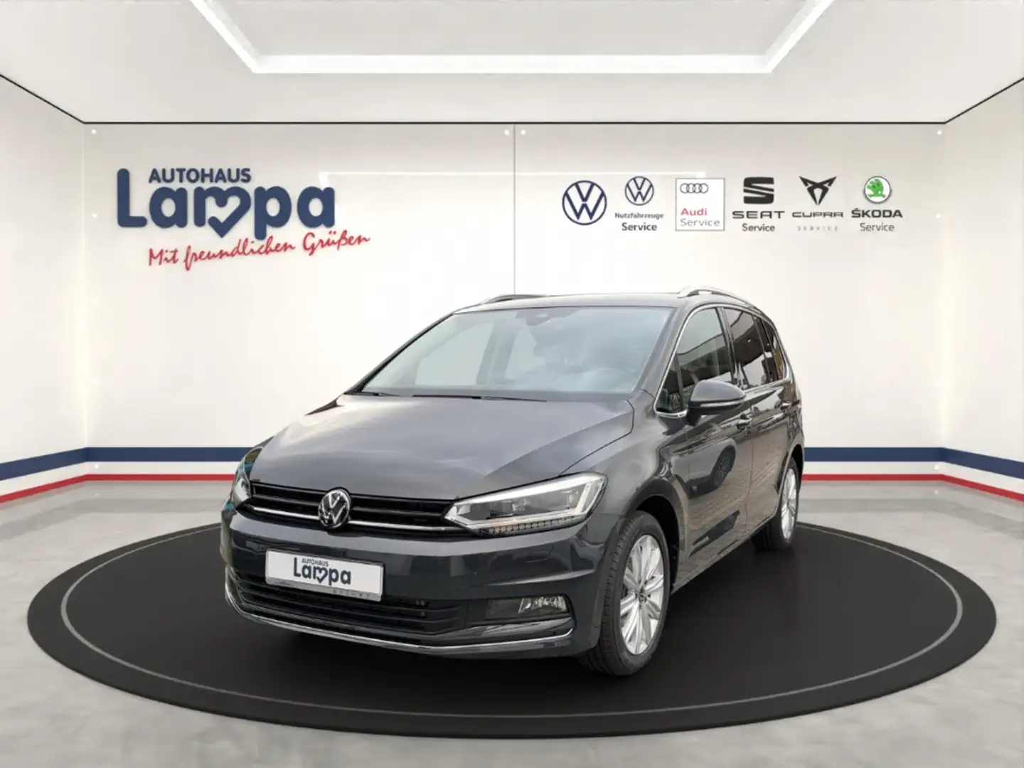 Volkswagen Touran BMT Start-Stopp EU6e Highline 1.5 l TSI OPF DSG AH Серый - 1