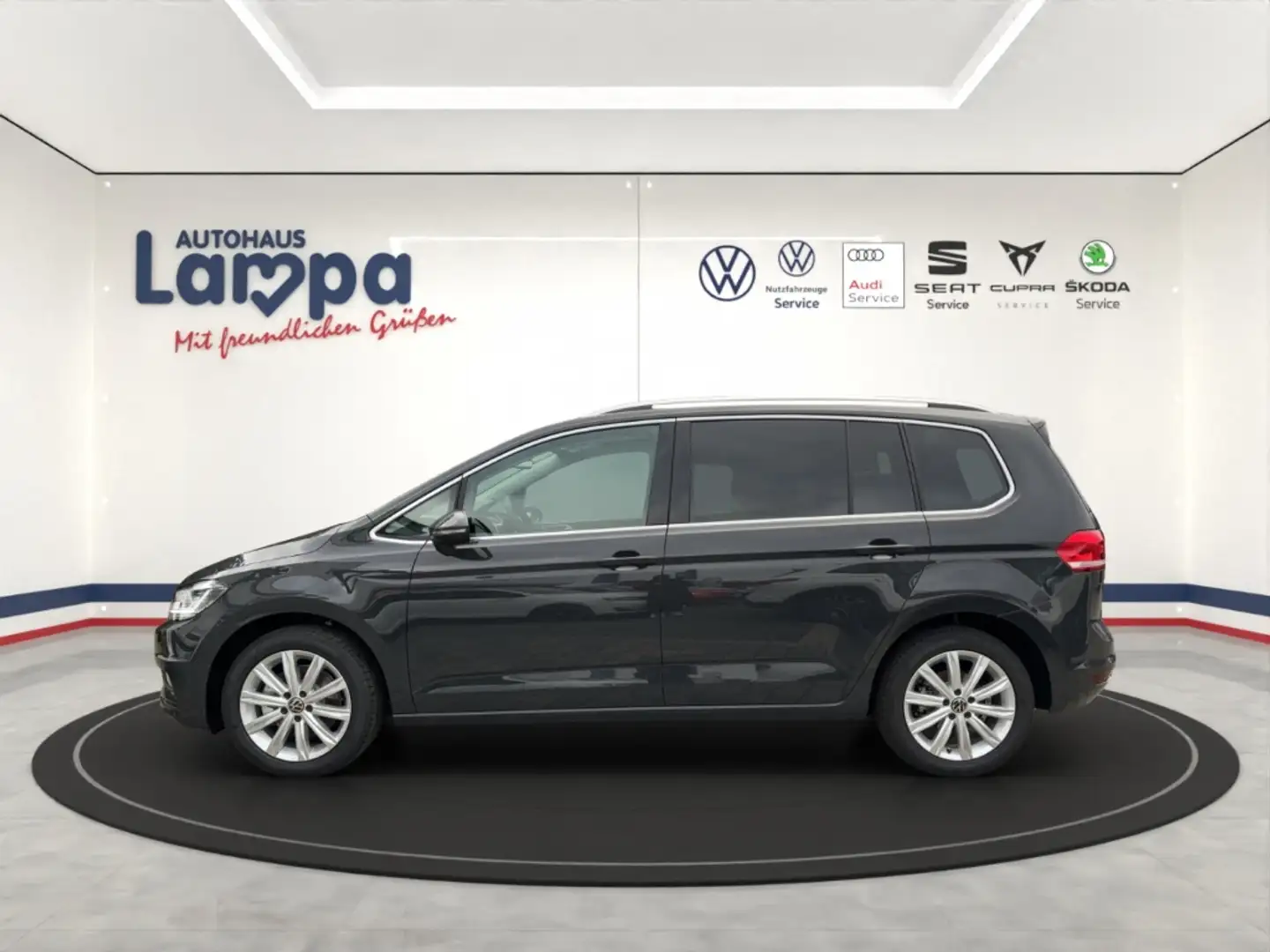 Volkswagen Touran Highline 1.5 l TSI OPF DSG AHK,MFK,DAB+,LED Серый - 2