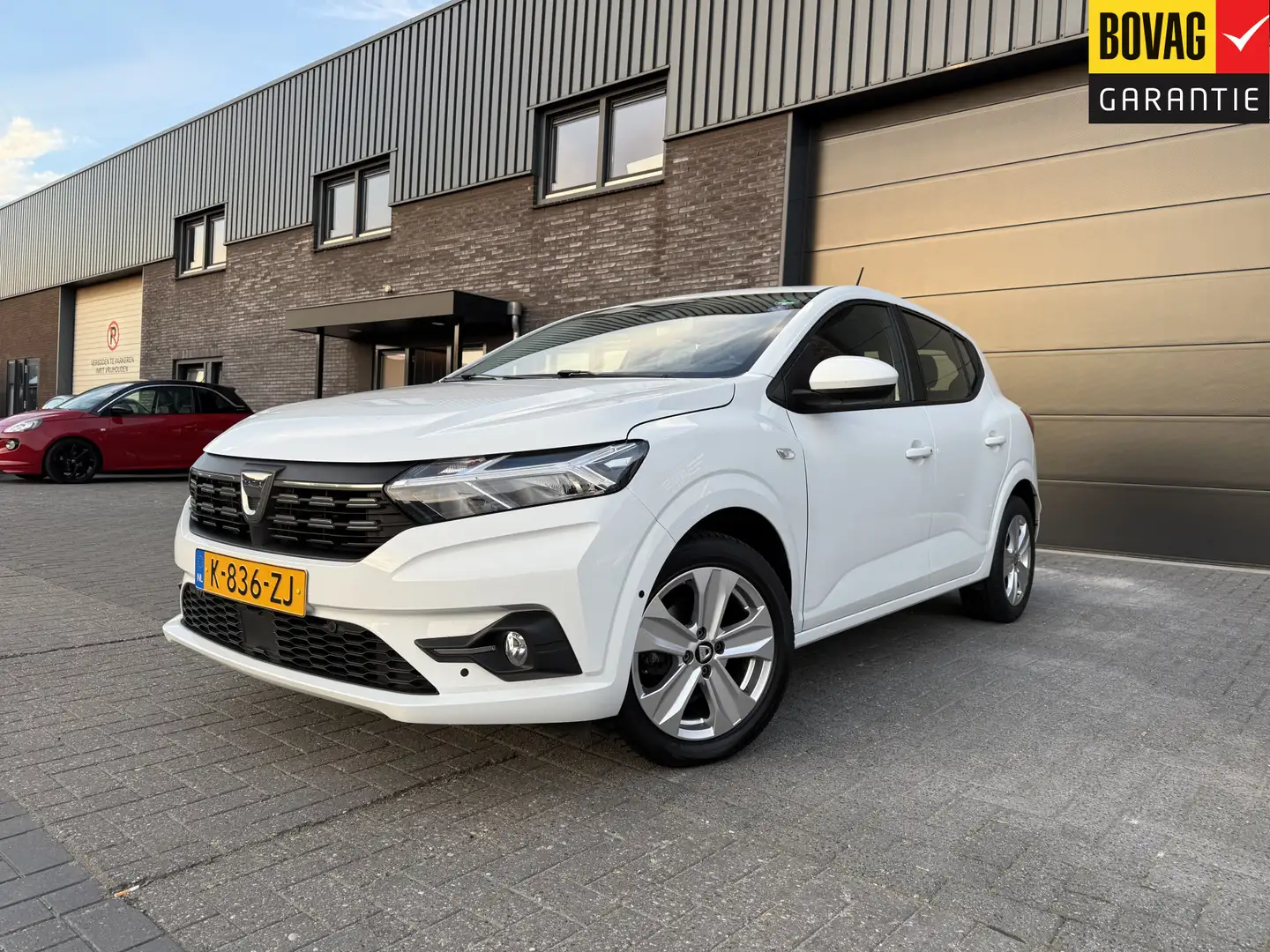Dacia Sandero 1.0 TCe 100 Bi-Fuel Essential | 1E EIGENAAR | 12MN Wit - 1