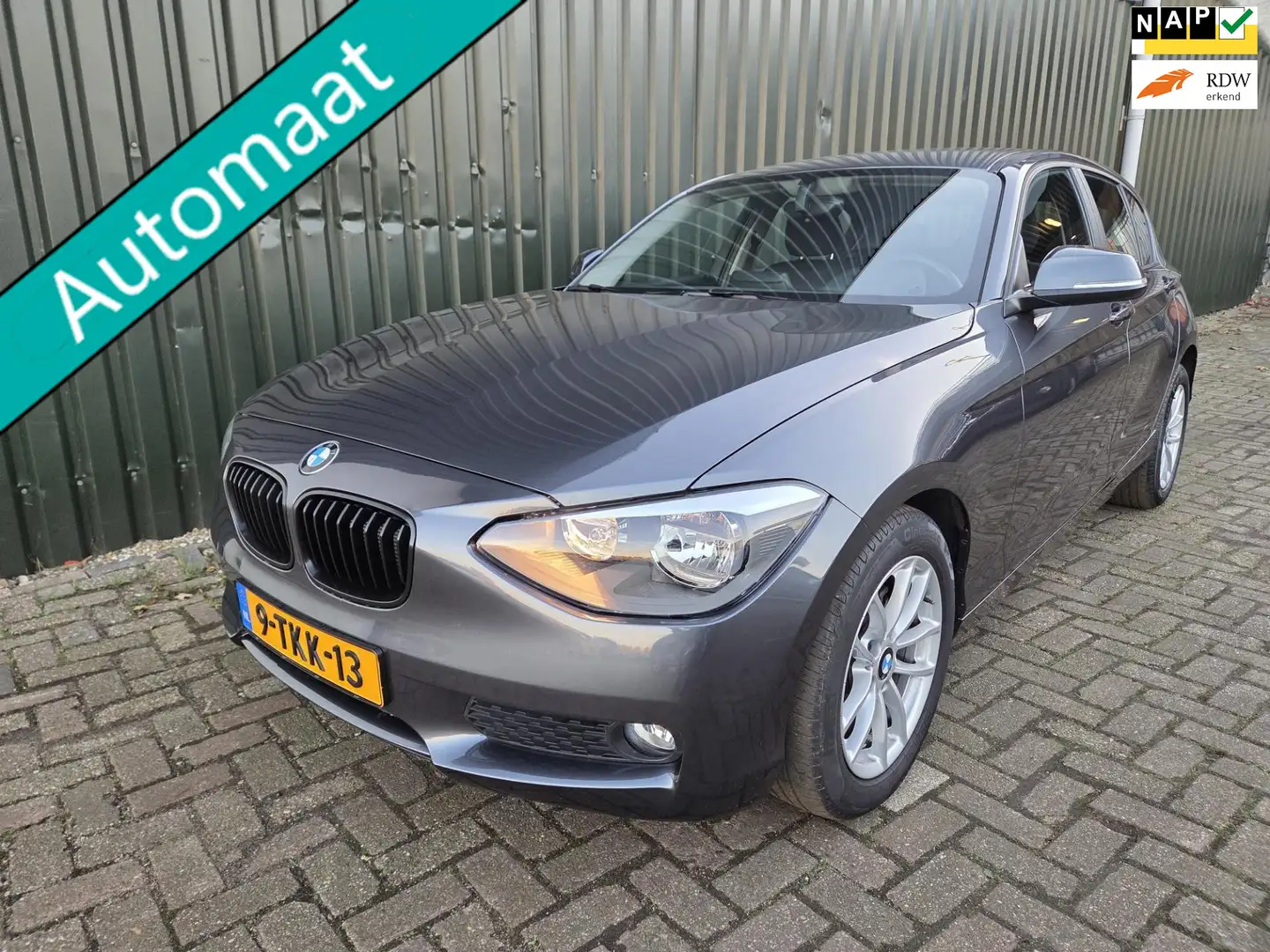 BMW 116 1-serie 116i Business 1e eigenaar 26000km!! Grijs - 1