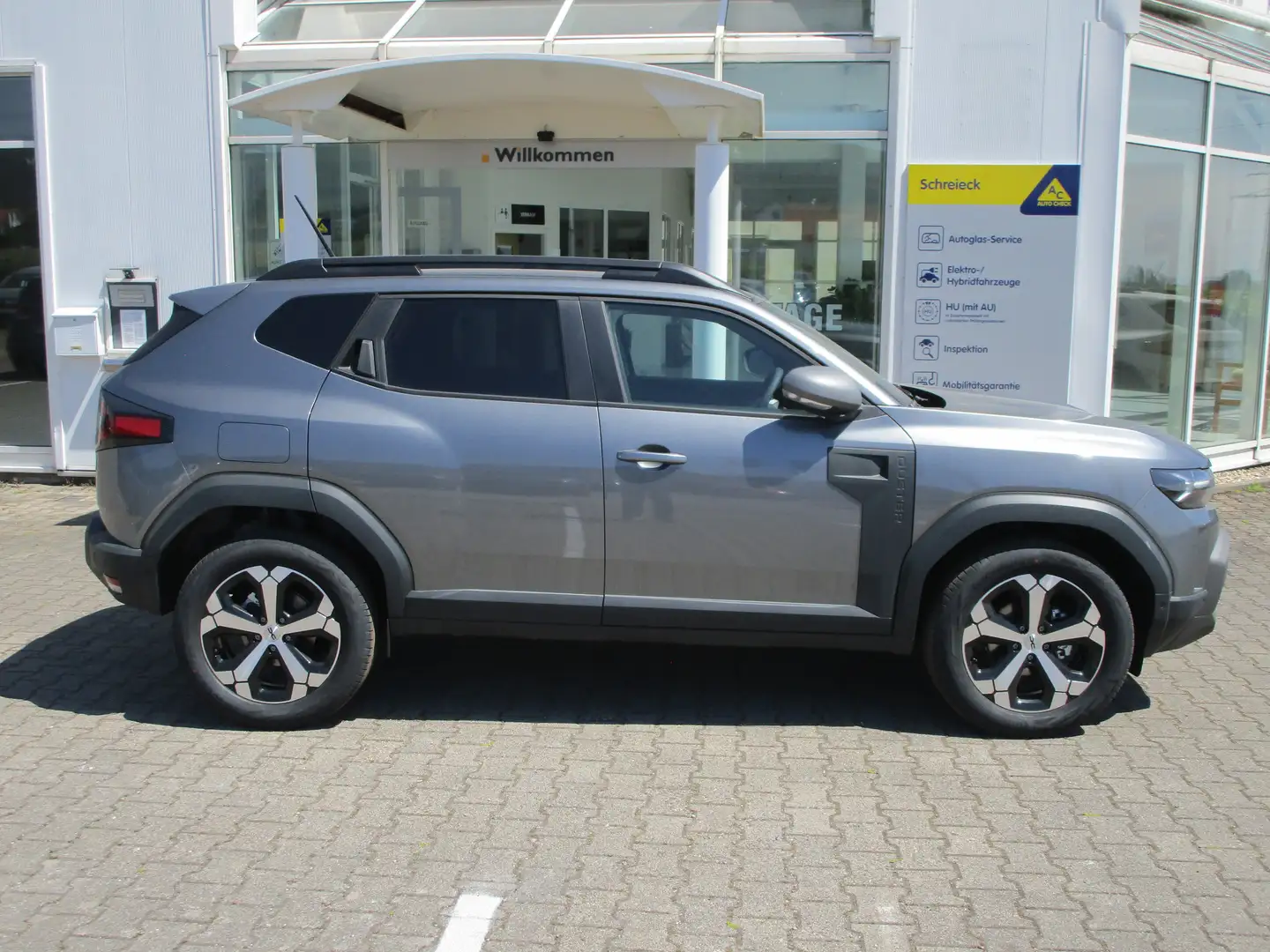 Dacia Duster TCe 130 Journey, Navi, Sitzheizung v. Gris - 2