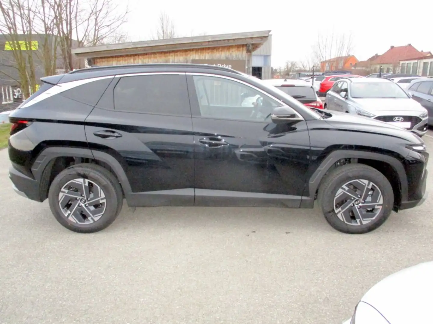Hyundai TUCSON NX4 Jubile 1,6 T-GDi HEV 4WD AT t6hj2 Schwarz - 2