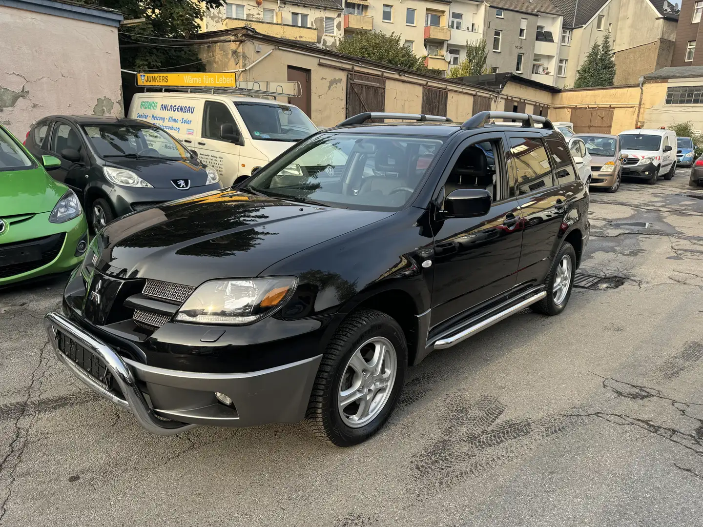 Mitsubishi Outlander 2.4 Sport*Automatik*1.Hand*TÜV NEU*Schiebedach* Schwarz - 1