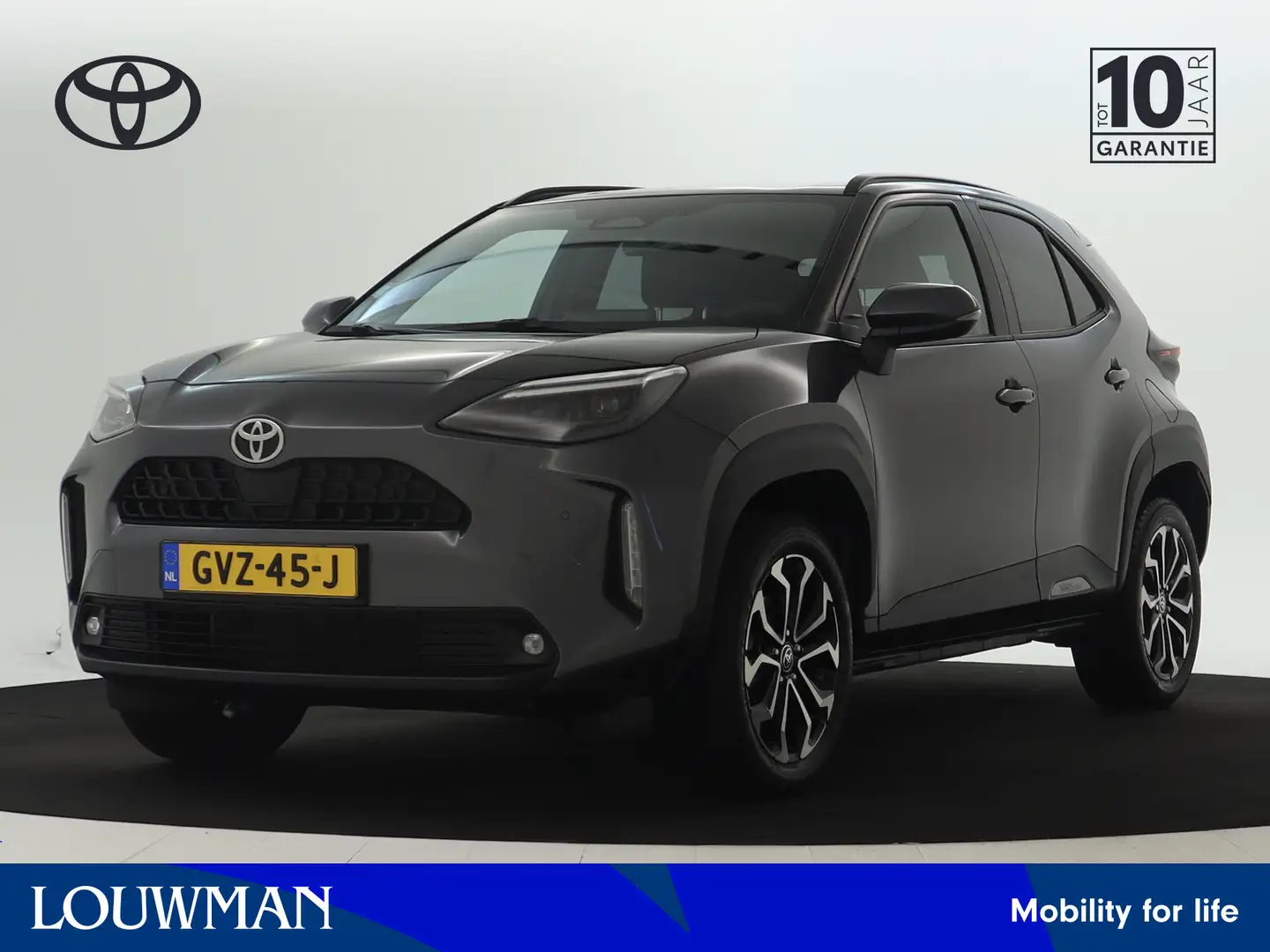 Toyota Yaris Cross 1.5 Hybrid 115 First Edition | Trekhaak | Parkeers Grijs - 1