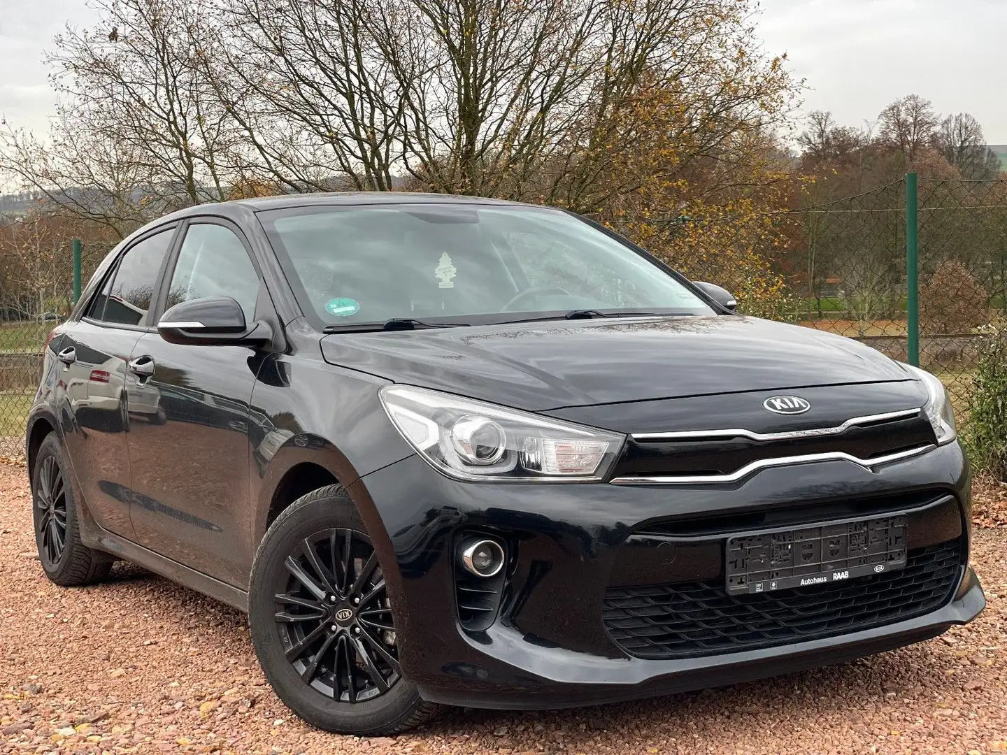 Kia Rio 1.2 Dream Team*SHZ*Klimaautom.*8-fach Alu* Schwarz - 1