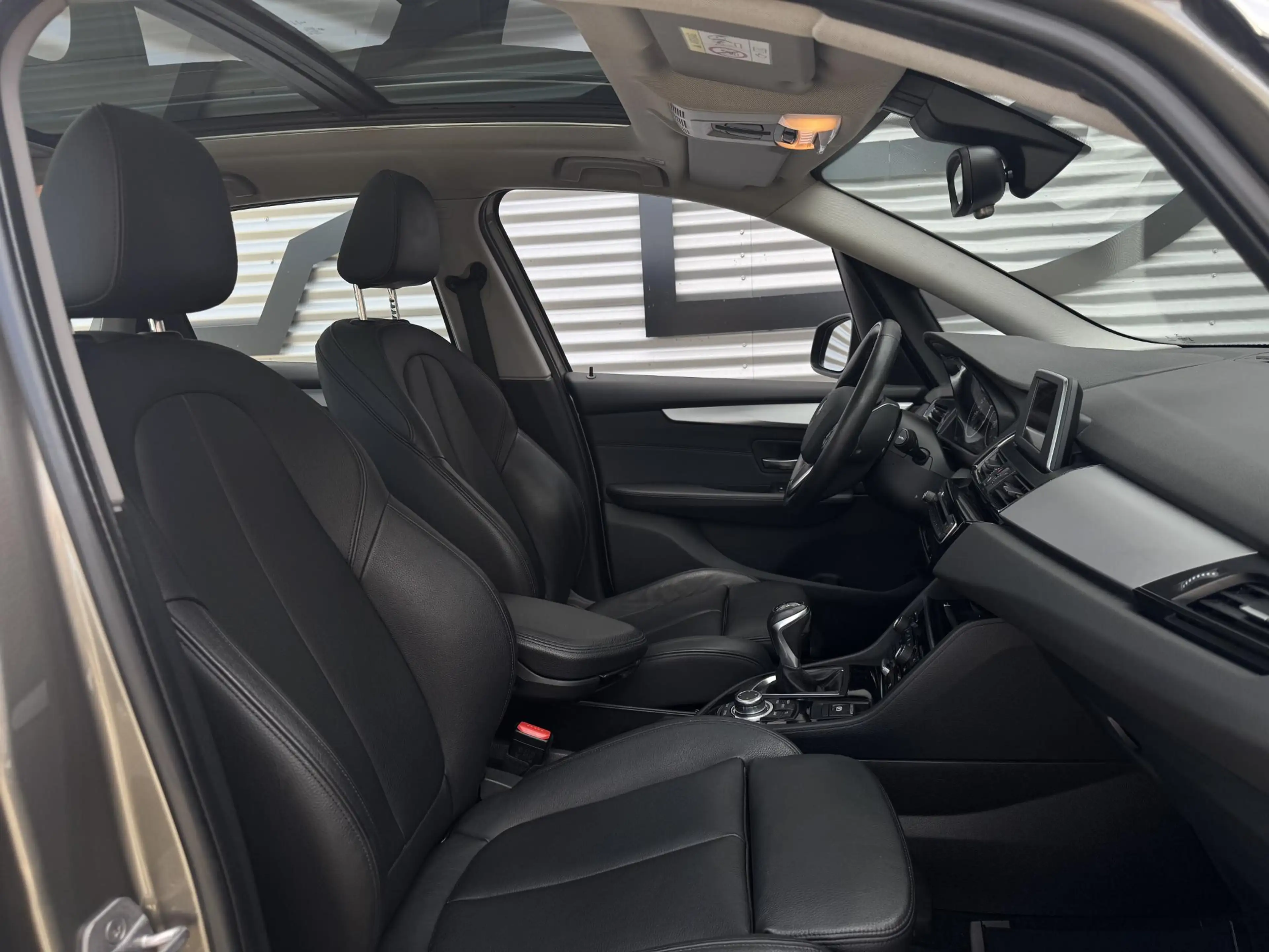 BMW 220 2-serie Active Tourer 220i 2e Eigenaar|Navi|Pano|L — photo 7