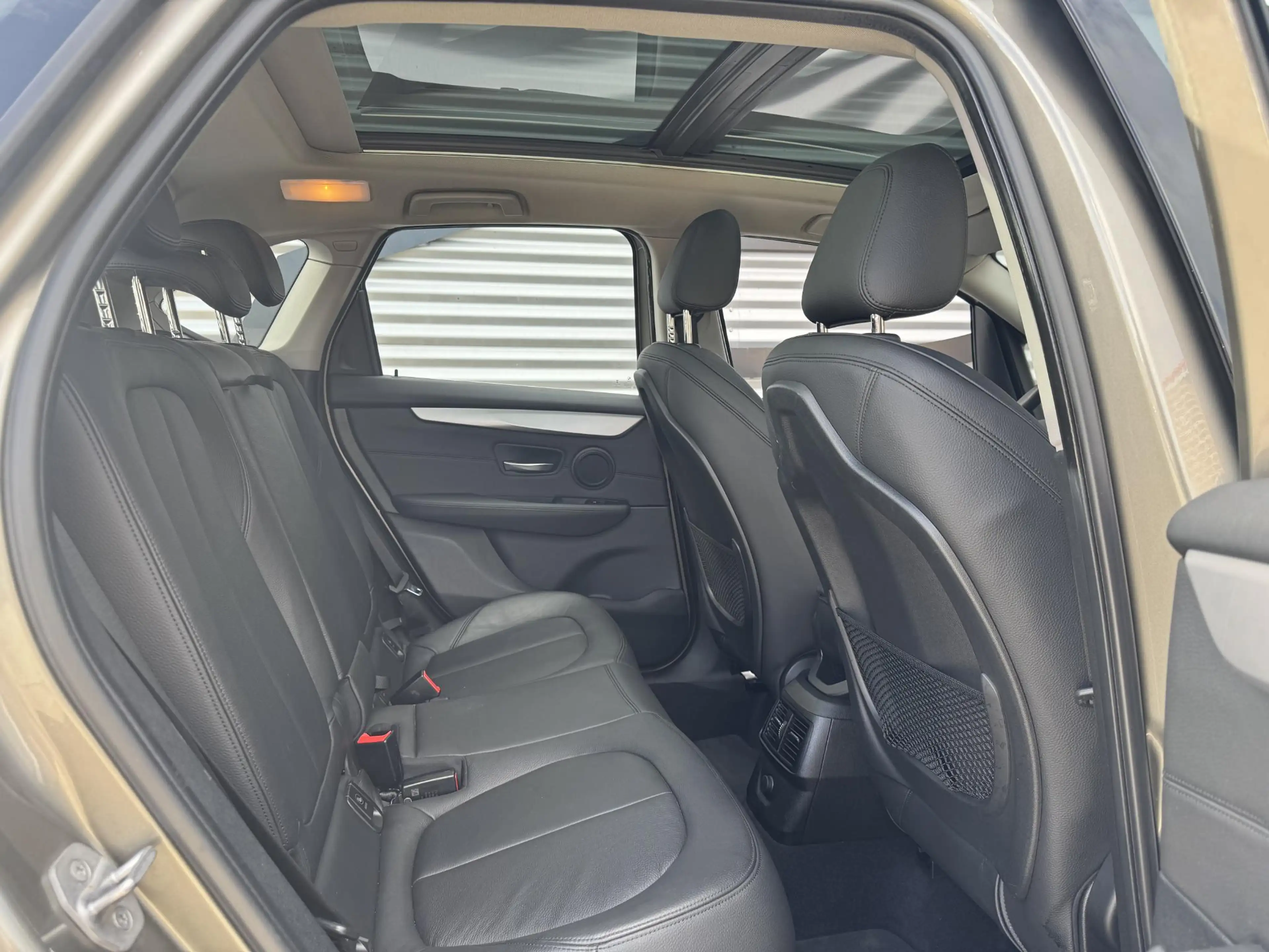 BMW 220 2-serie Active Tourer 220i 2e Eigenaar|Navi|Pano|L — photo 11