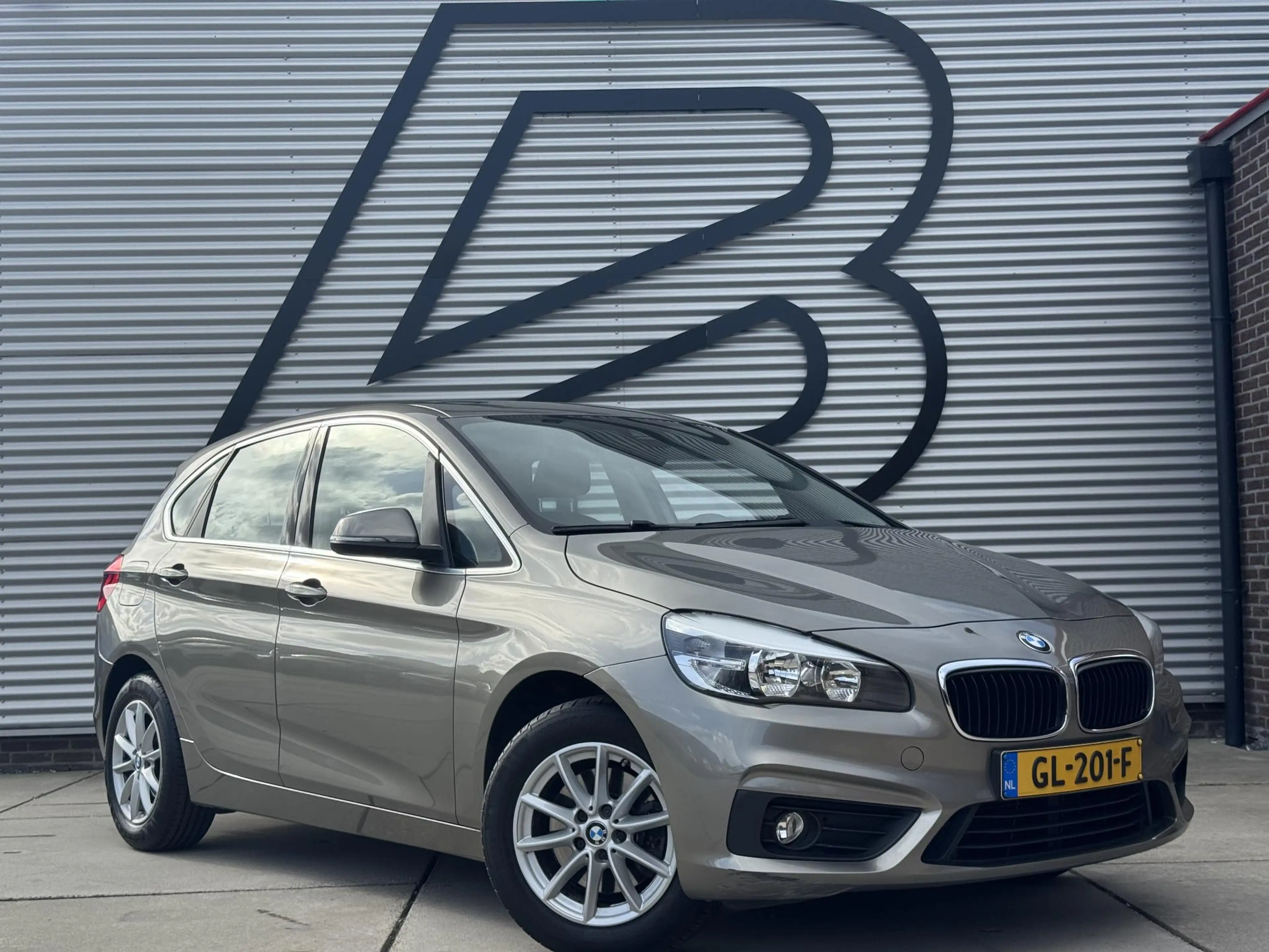 BMW 220 2-serie Active Tourer 220i 2e Eigenaar|Navi|Pano|L — photo 8