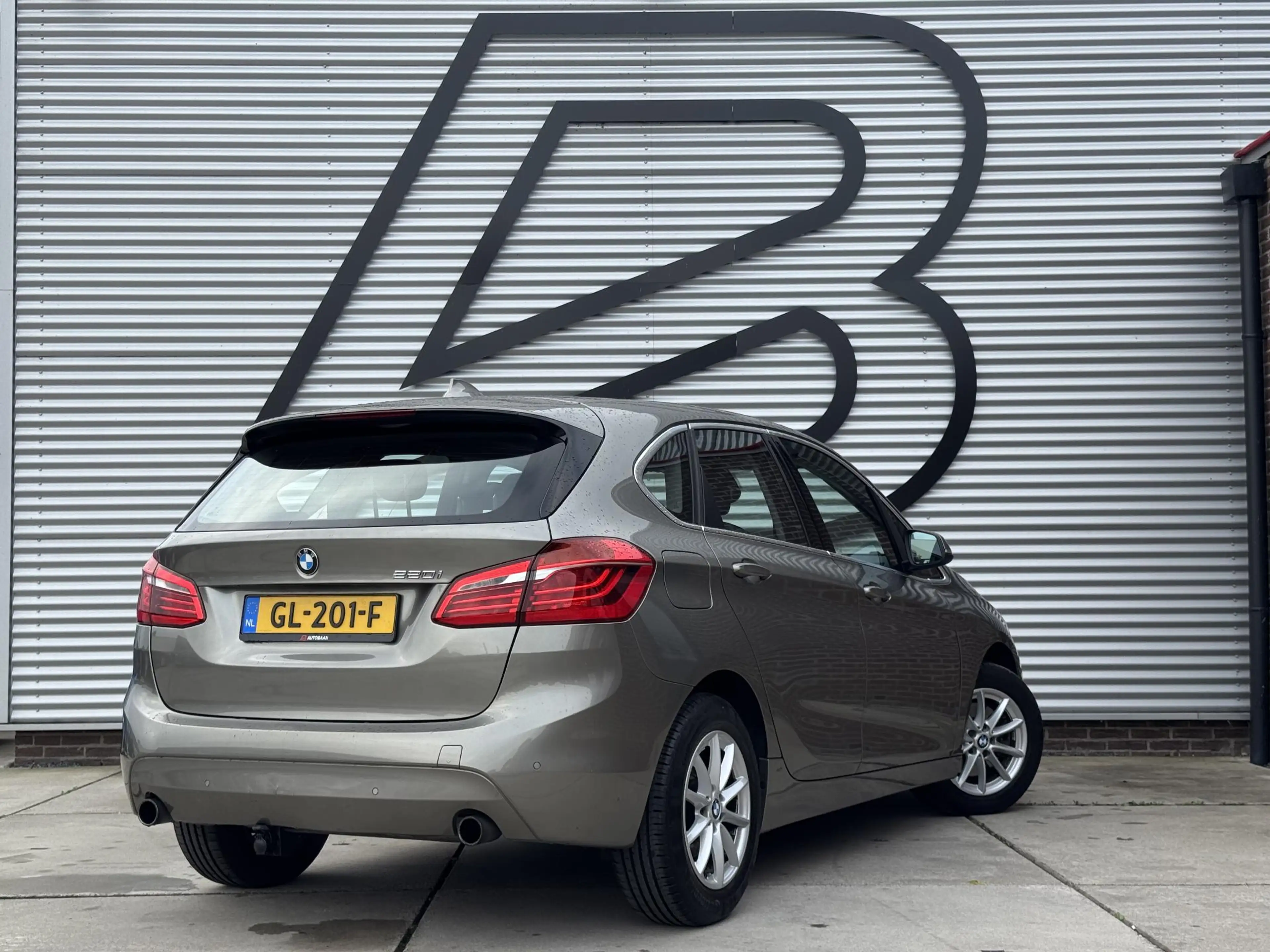 BMW 220 2-serie Active Tourer 220i 2e Eigenaar|Navi|Pano|L — photo 3