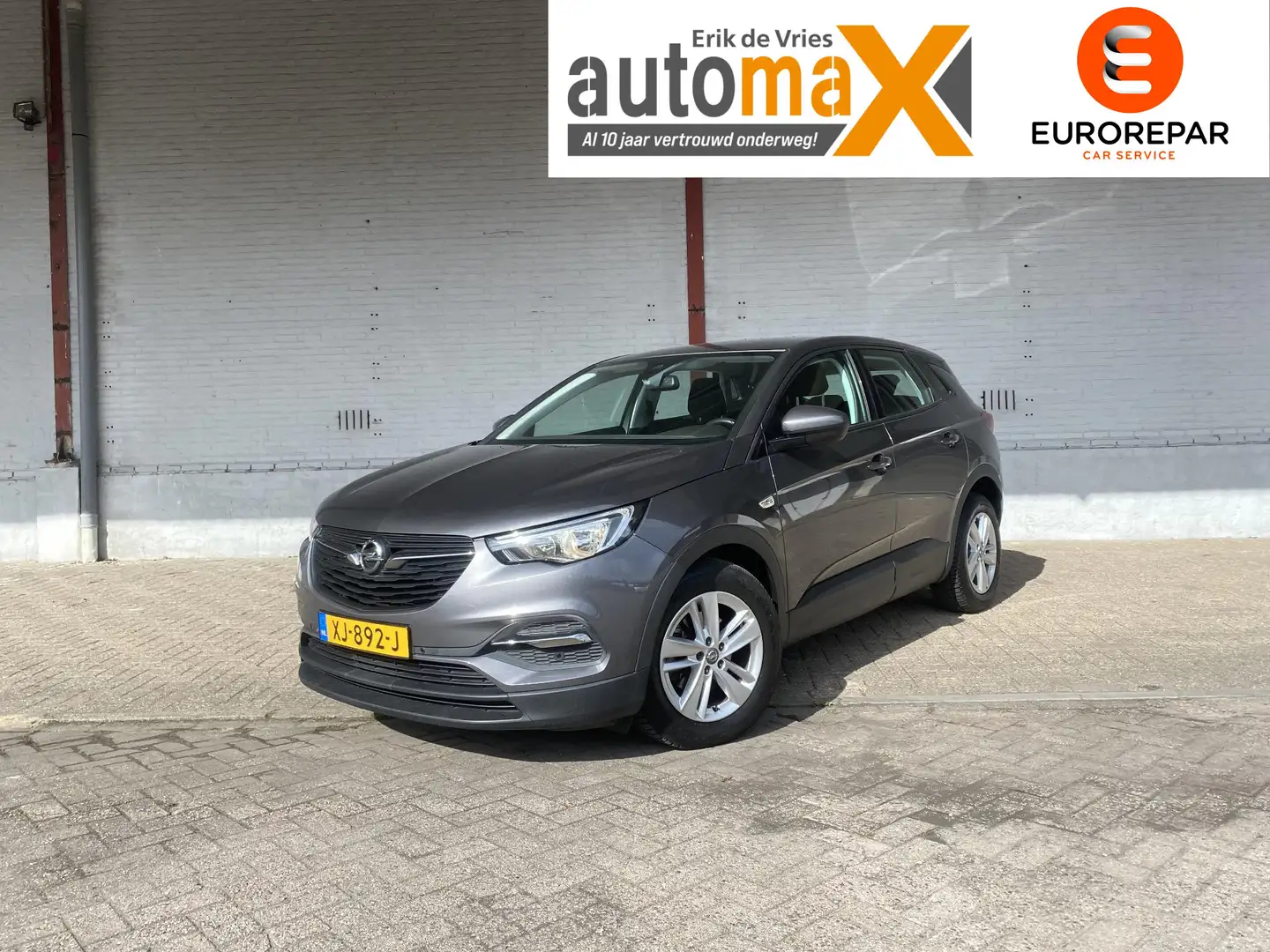 Opel Grandland X 1.2 Turbo Online Edition |CarPlay!|Navi!|Automaat! Grijs - 1