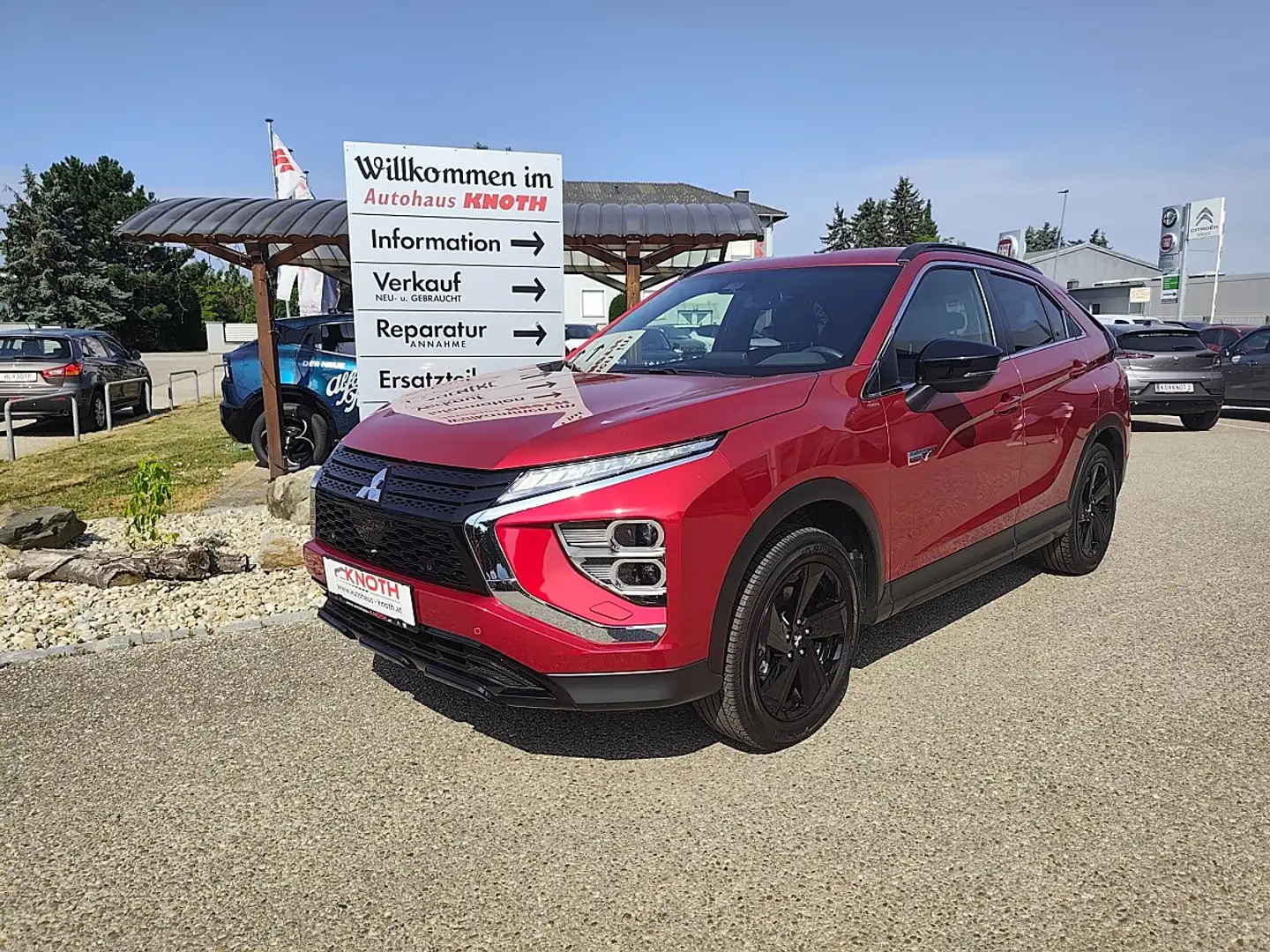 Mitsubishi Eclipse Cross 2,4 PHEV 4WD 45 Jahre Edition CVT Aut. Rot - 1